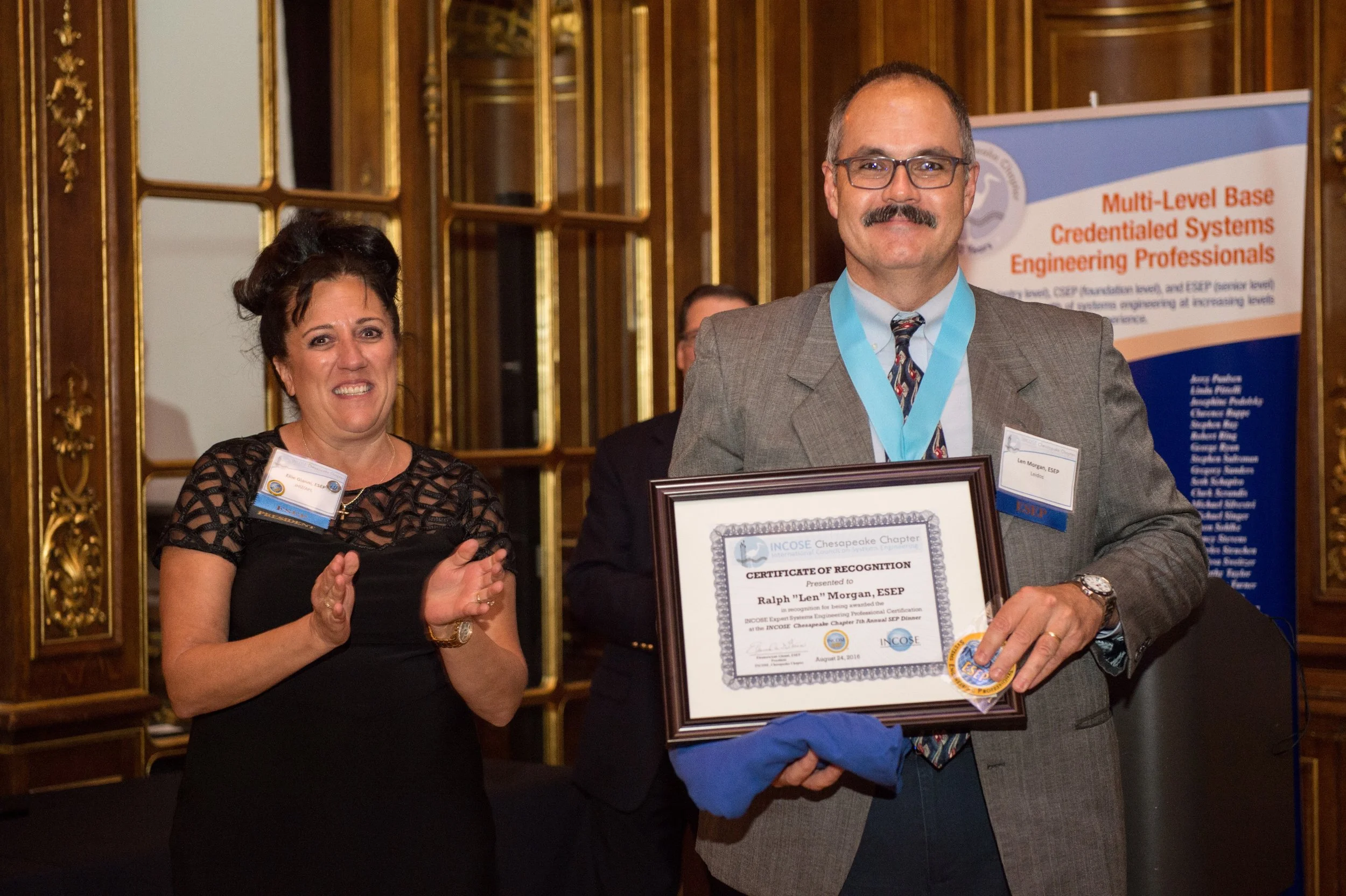 Len Morgan from Leidos, receives his ESEP Certificate.
