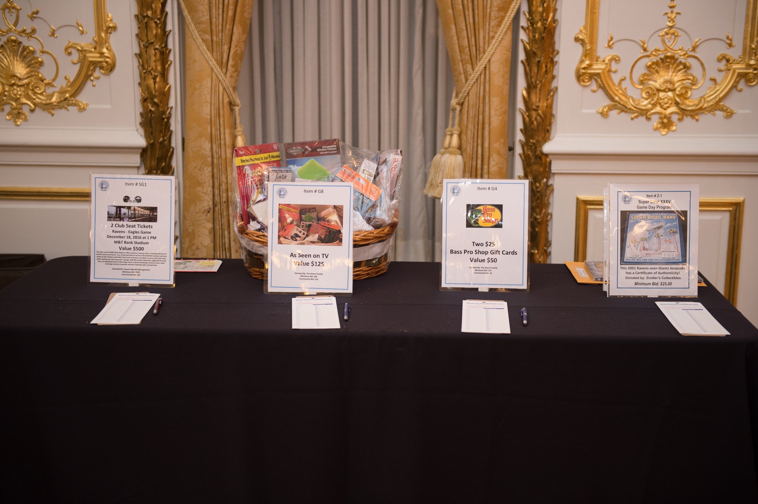 Items available at the Silent Auction included Ravens Tickets, an “As Seen on TV” Gift Basket, Bass Pro Shop Gift Cards, and a Super Bowl Game Day Program 