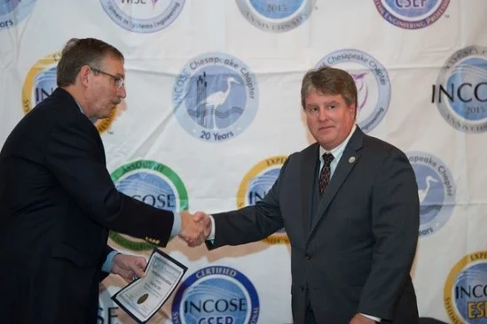 Mike Pafford, Chapter President, thanks Craig Tyler, ESEP, for his service as Secretary for the past two years.