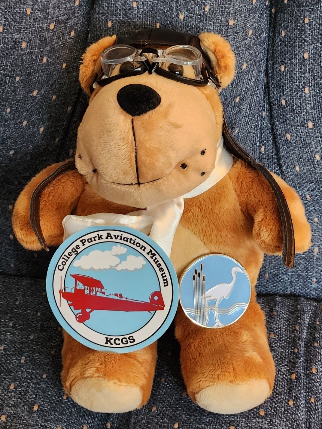 “The Aviator” with his museum sticker and the Chesapeake Chapter coin, one of which was given to Samantha Ferris at the end of the event.