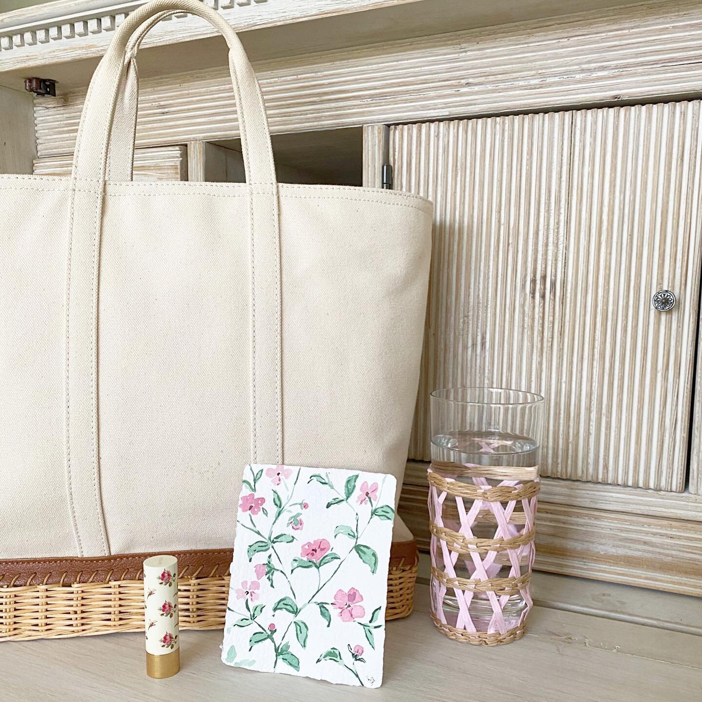 Looks like Spring on my desk this morning 🌸 

Tote and lipstick linked here ➡️
 http://liketk.it/39CYE  I also included more bags by the designer that I found on sale!!! The one pictured can now be monogrammed and personalized...I have had mine for 