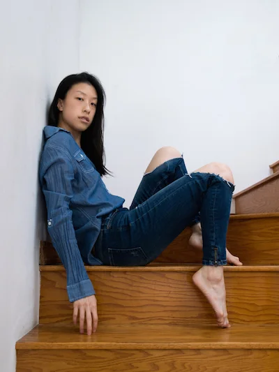 Female east asian style blogger wearing all denim blue outfit