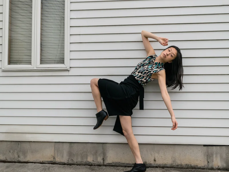 Gi Shieh Sustainable Style blogger wearing blue leopard print top and black skirt