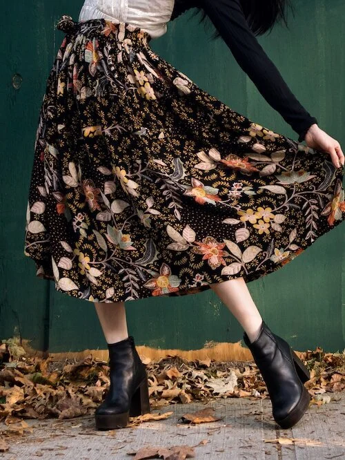 Floral skirt details and black platform boots