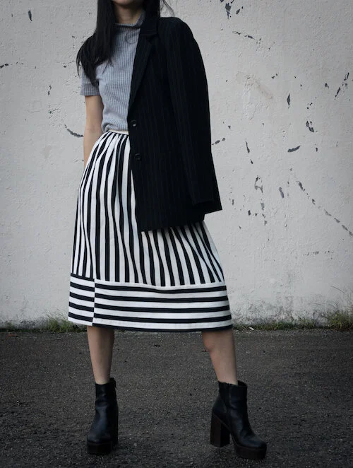 Striped top, striped skirt, striped blazer, black platform boots