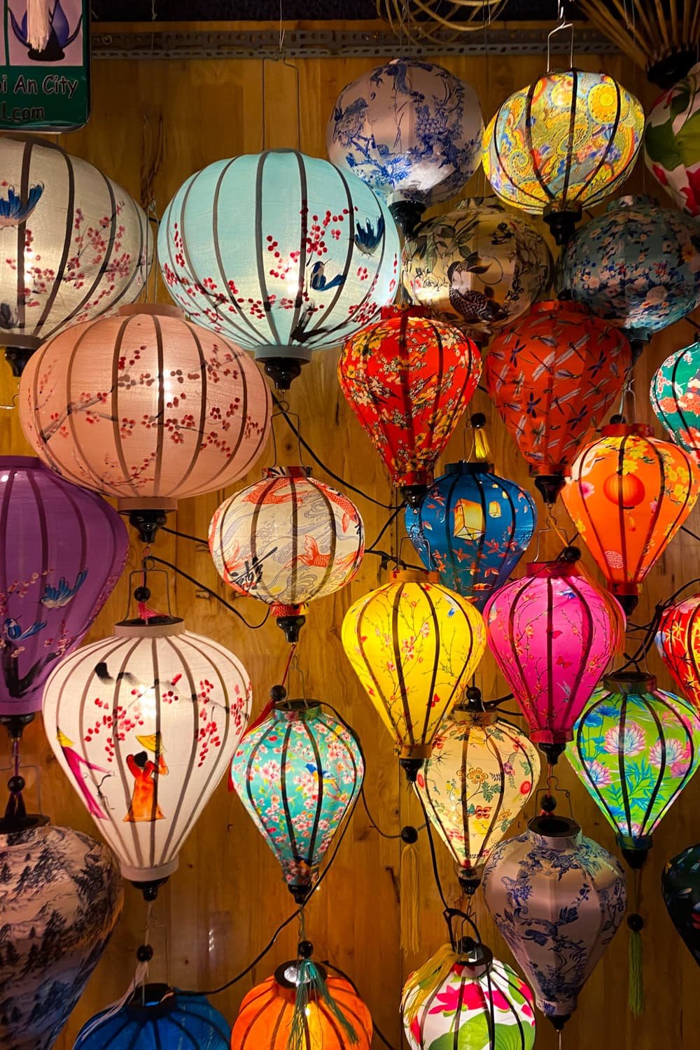 Vietnamese lanterns hanging on a wall in Hoi An.