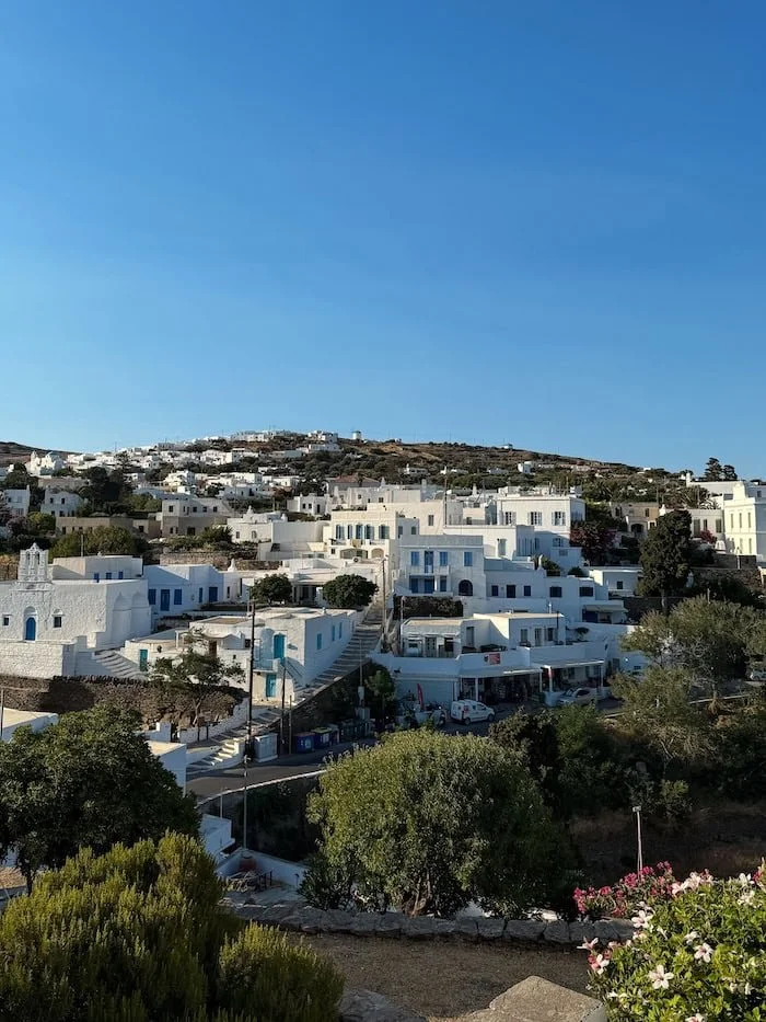  View of a Greek island town from the sea. The best eSIM for Greece provides reliable data between islands. 