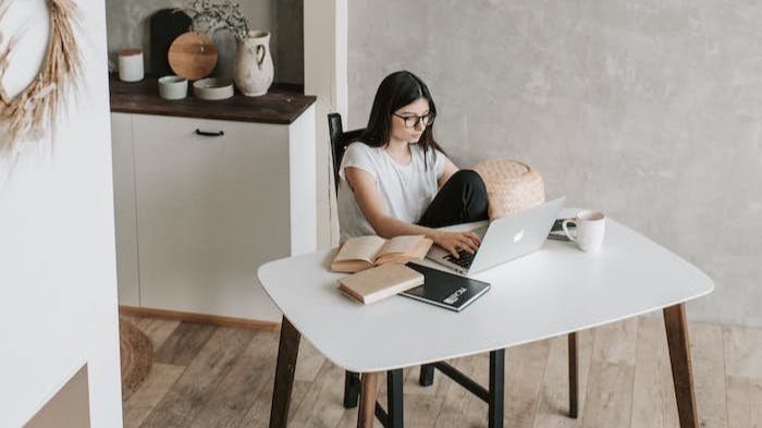Online Class or Workshop woman sitting at desk