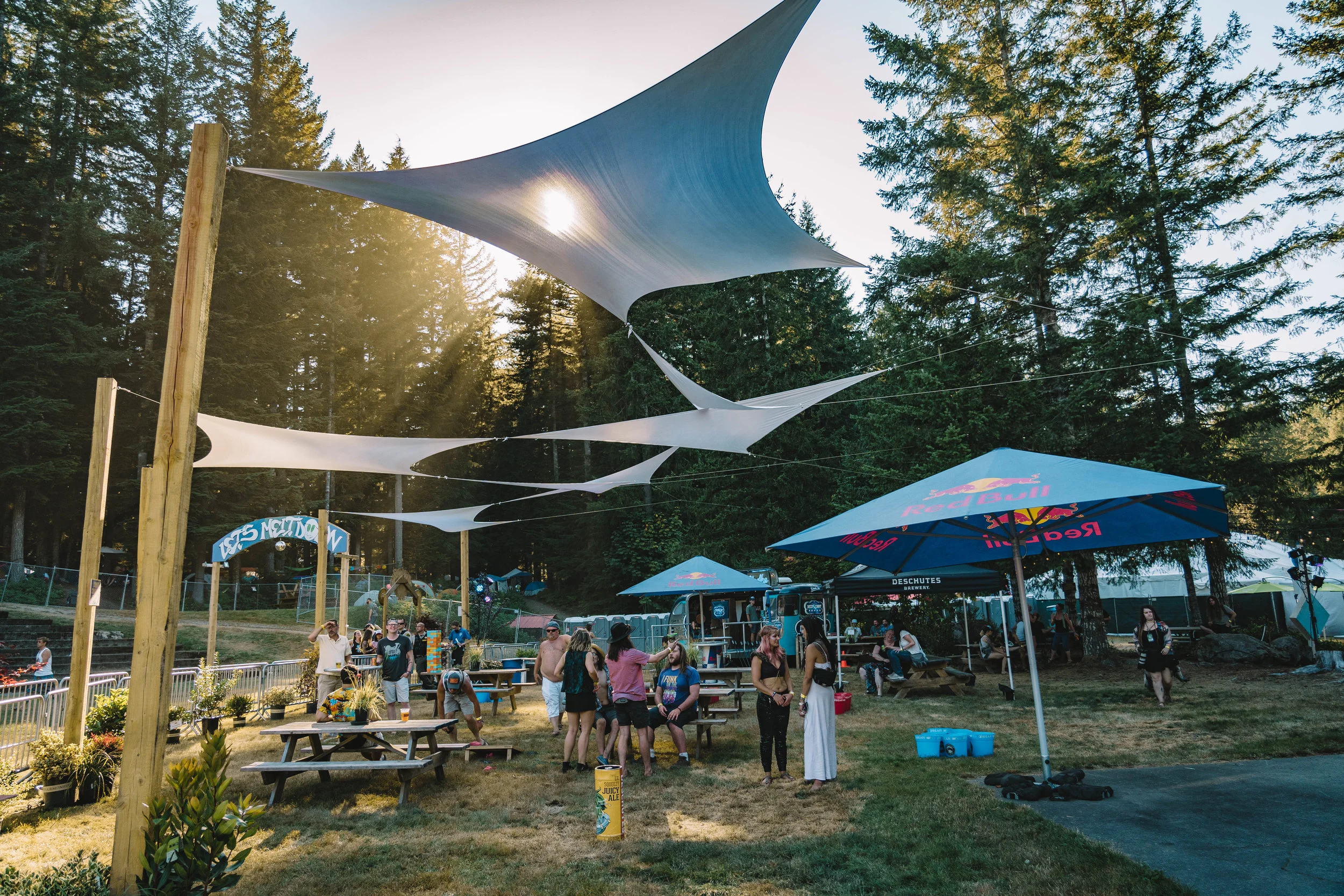  The beer garden directly abuts the Cabin Stage and offers affordable beers by Deschutes and cocktails from Deep Eddy Vodka. 