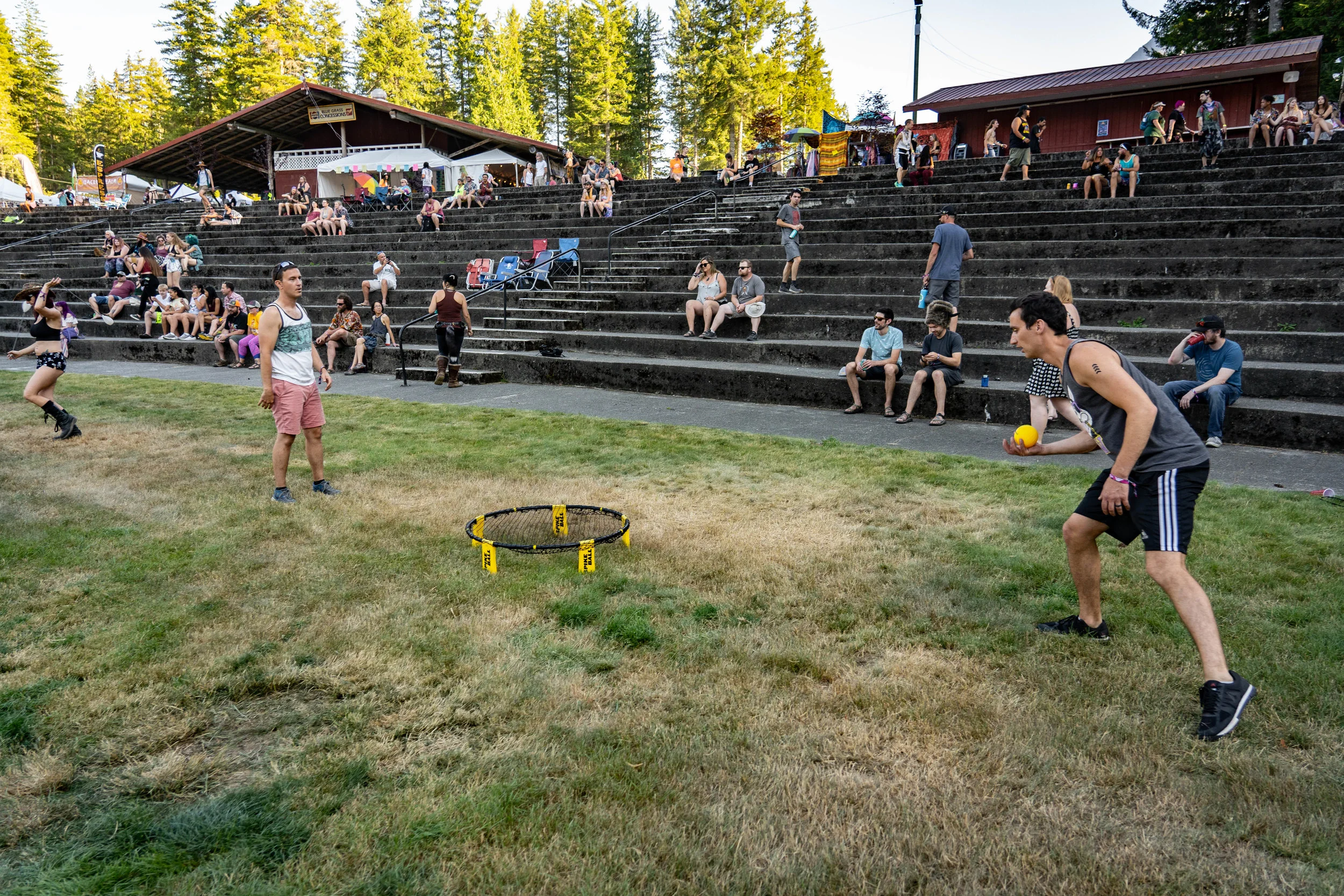  A game of Spikeball in front of Cabin Stage. 