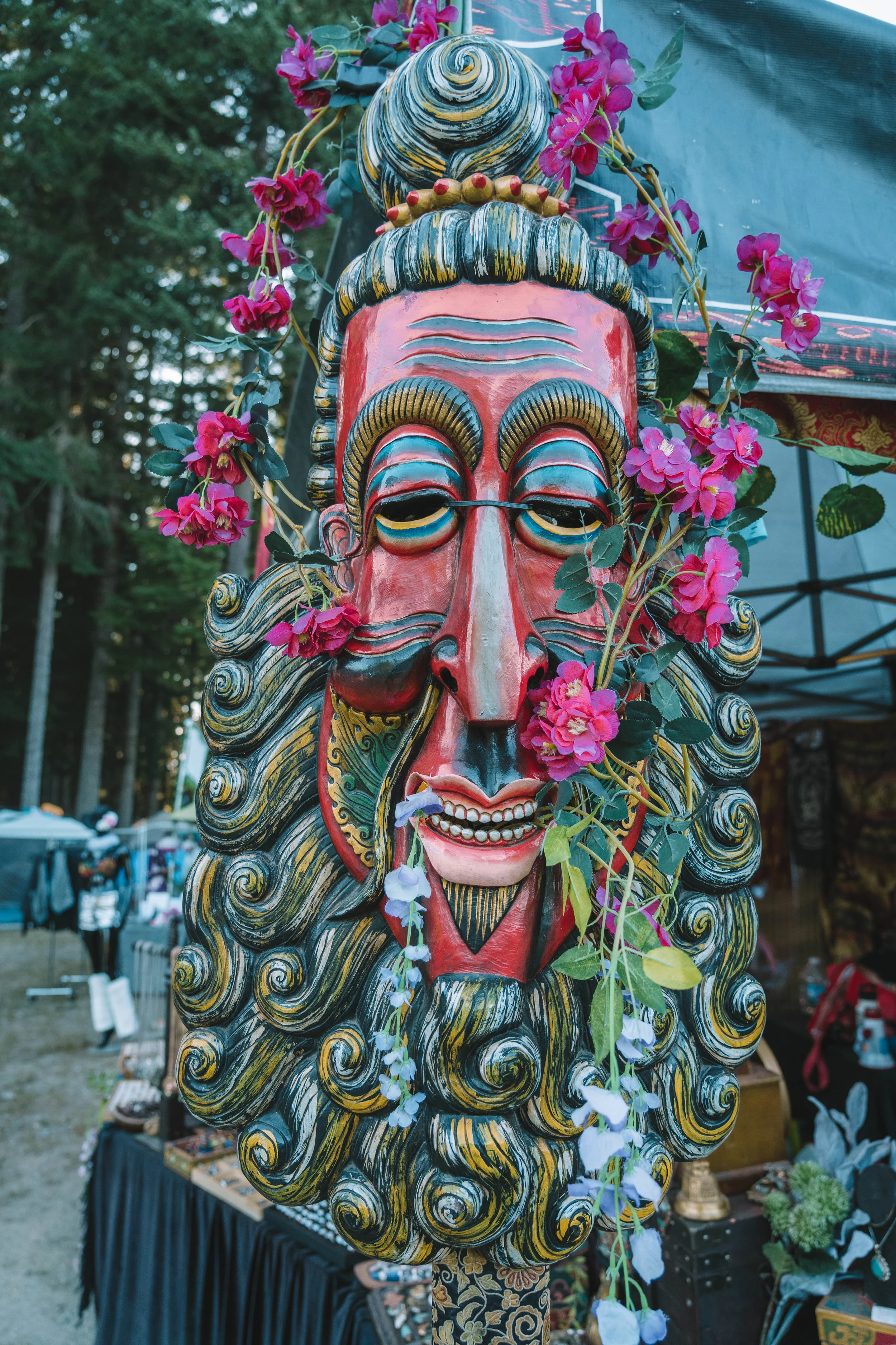  A tribal mask decorates the Culture Connection vendor shopfront. 