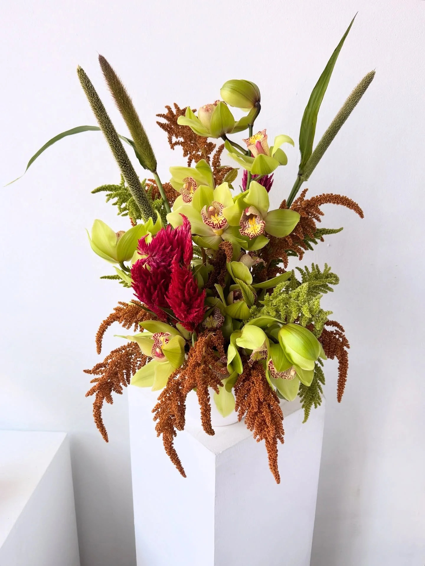 This one again cuz something weird happened with the tone when I posted it originally.  I had fun with two amaranth colors, local celosh and an insane orchid with some millet claws. Looks like a🦞.