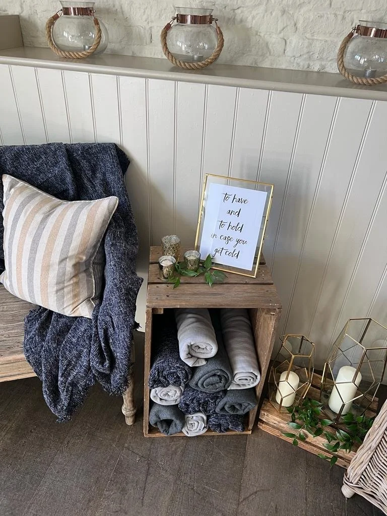 Wedding Blanket Display with crates and lanterns by All Things Pretty Weddings
