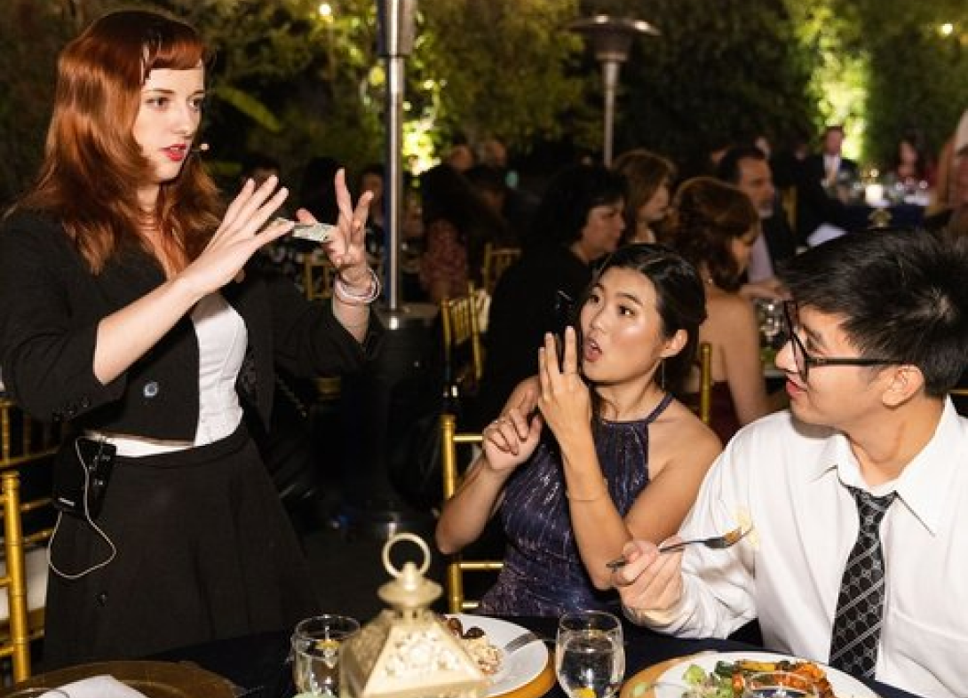 Magicians Strolling: Elevate Your Event with Magical Katrina’s Interactive Close-Up Magic