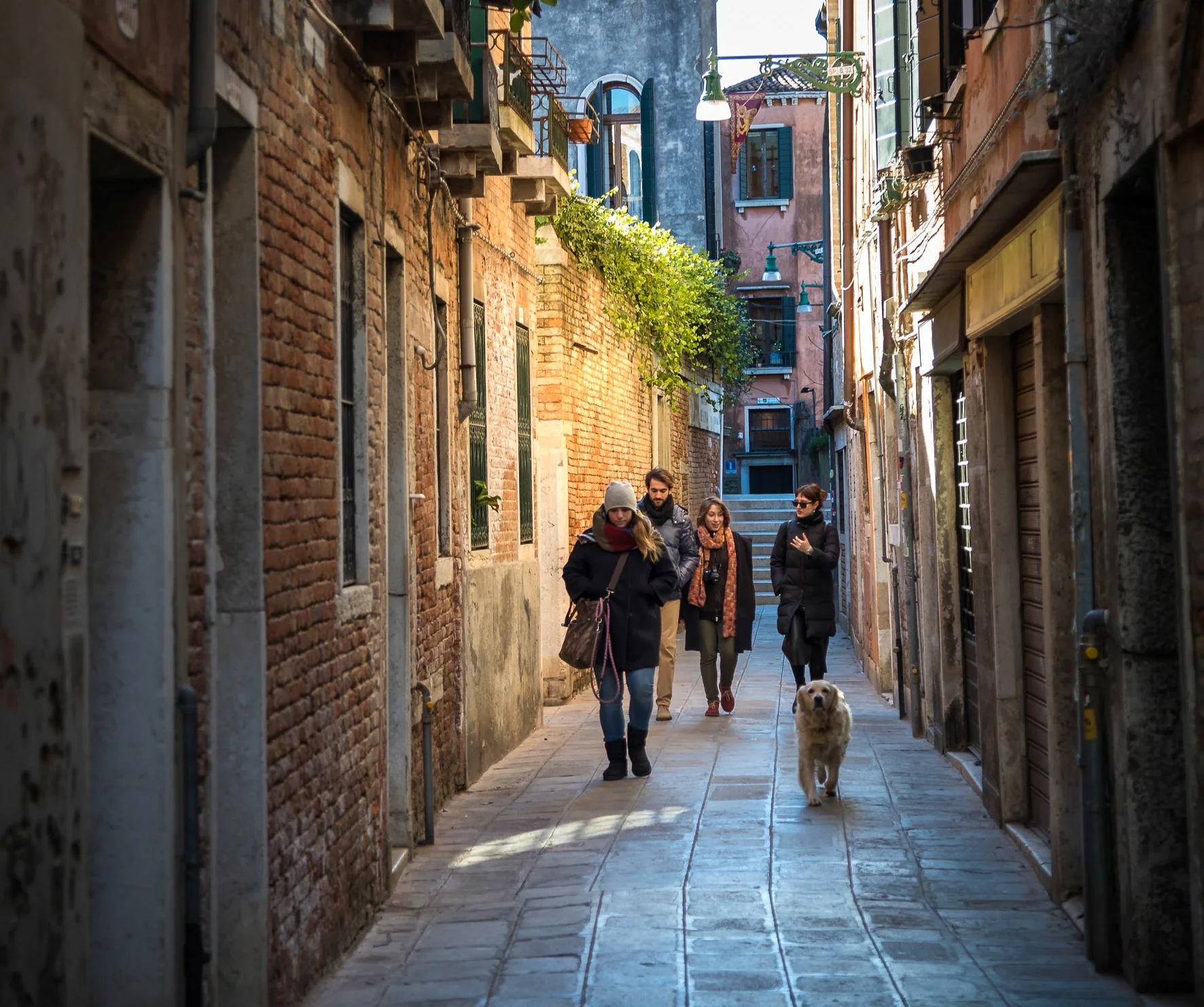 Travelers inside Venice lanes