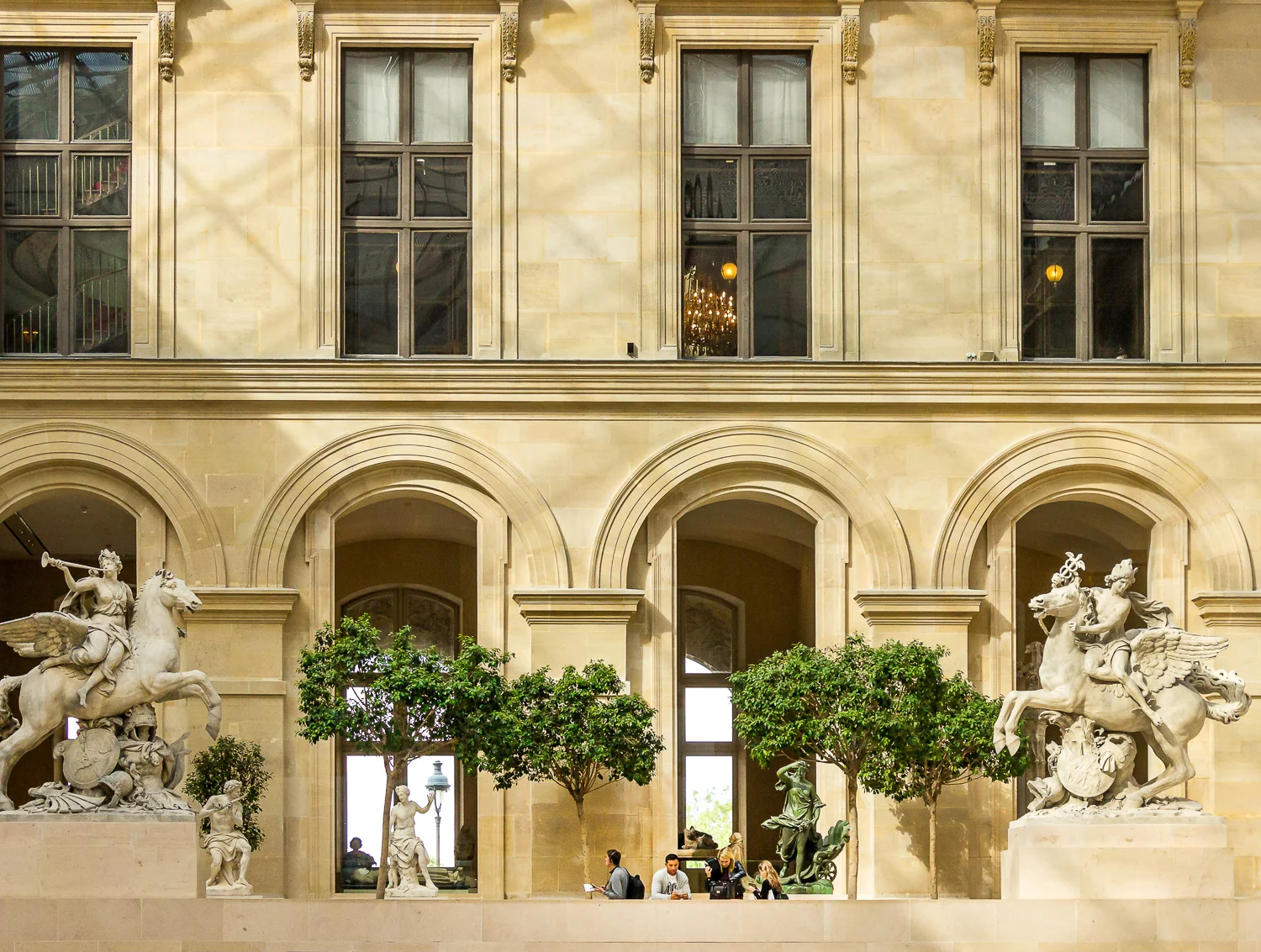 Travellers inside Louvre museum 