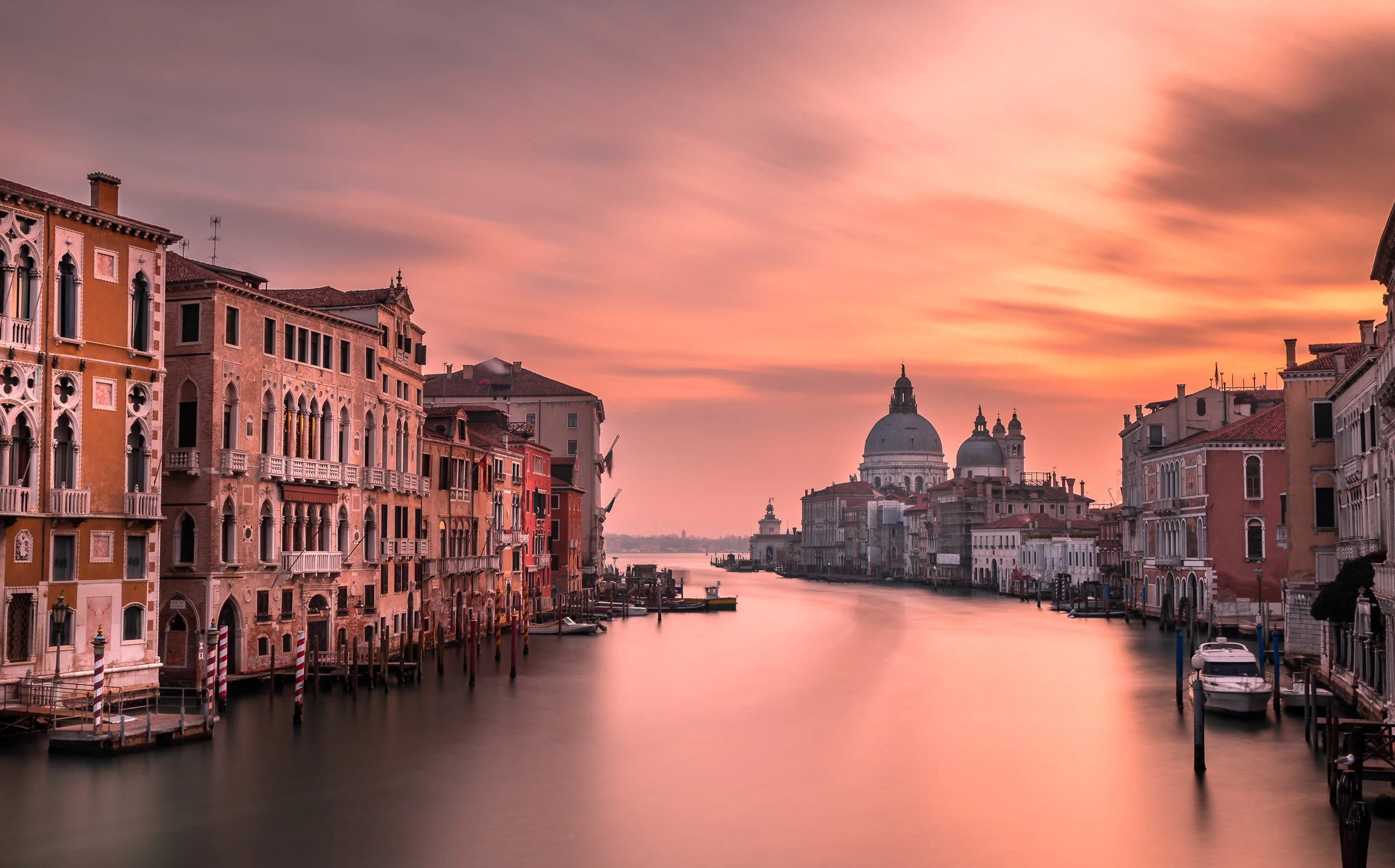 Venice sunrise over Grand Canal from Academia bridge.
