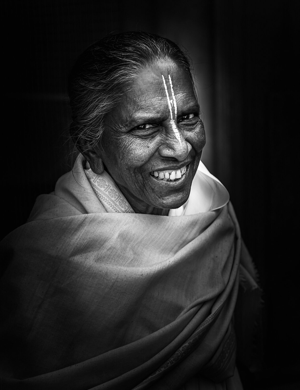 smiling widow of vrindavan by prathamesh dixit.jpg