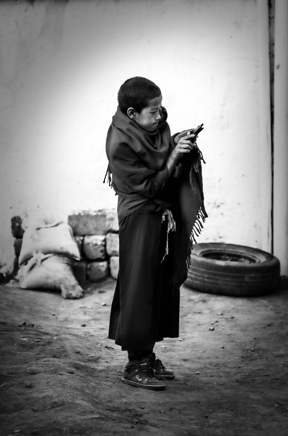 young monk with gun in key monastery by prathamesh dixit.jpg
