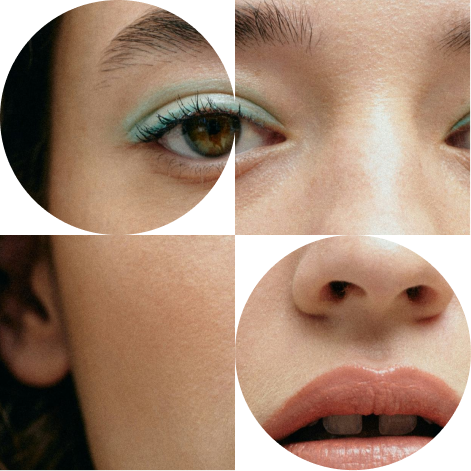 Close-up of a person's eyes, nose, and mouth with artistic circular cutouts.