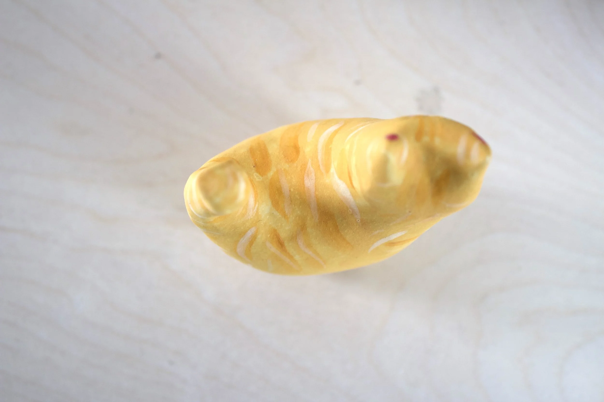 Top view Ginger Tabby handmade ceramic cat sculpture.jpeg