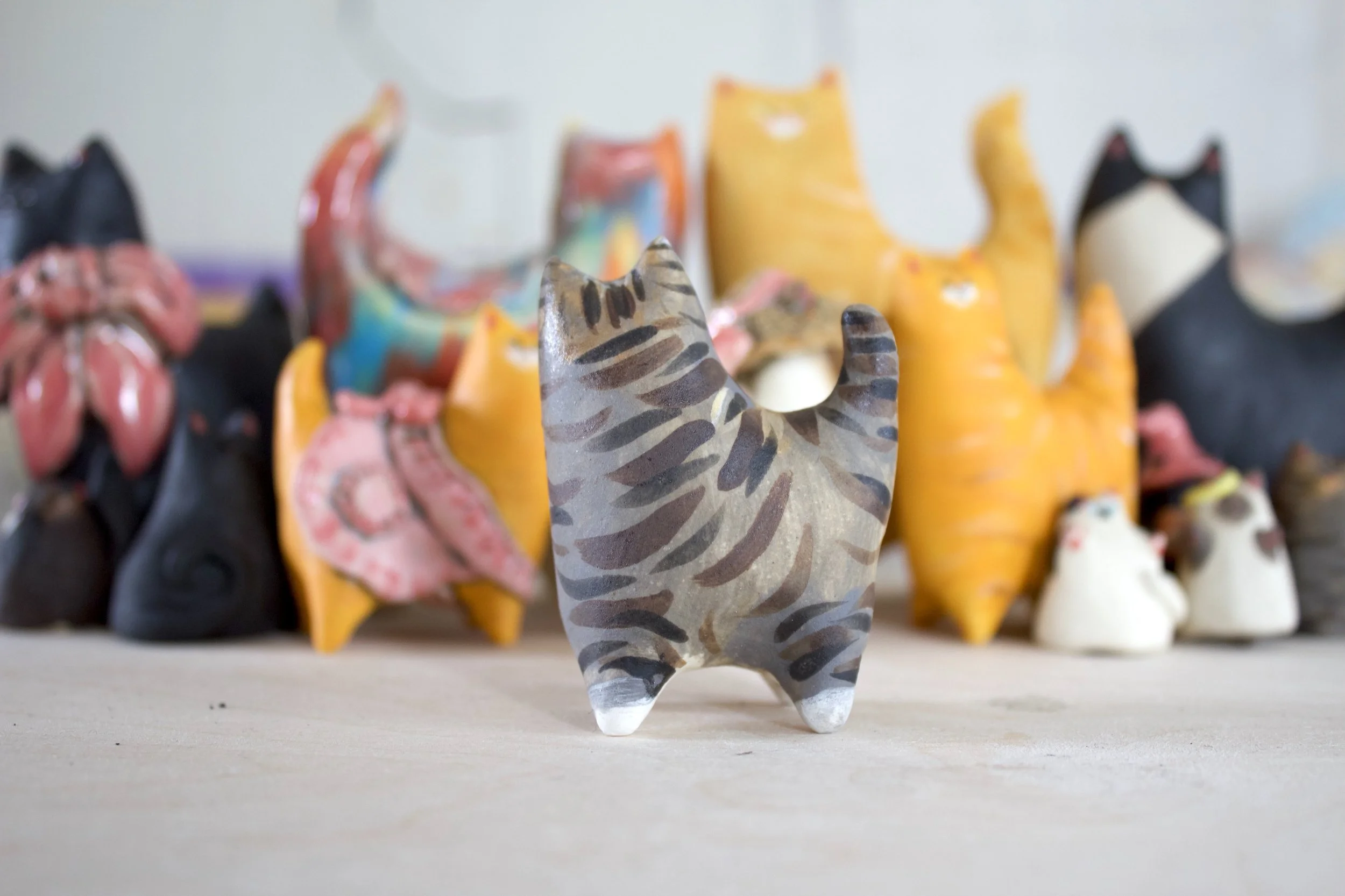 Side view Standard Issue Tabby ceramic cat sculpture.jpeg