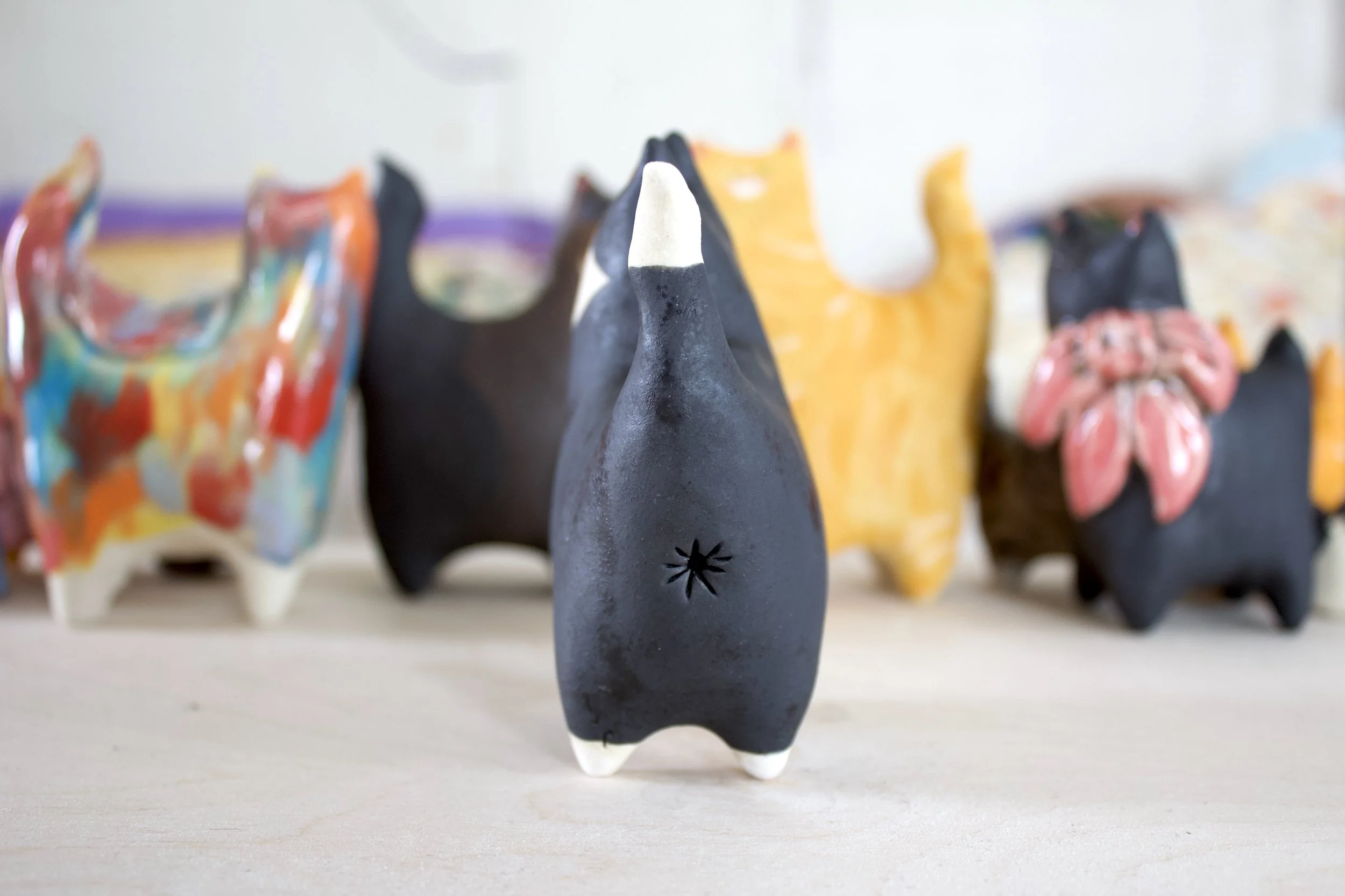 Back view Tuxedo ceramic cat sculpture.jpeg
