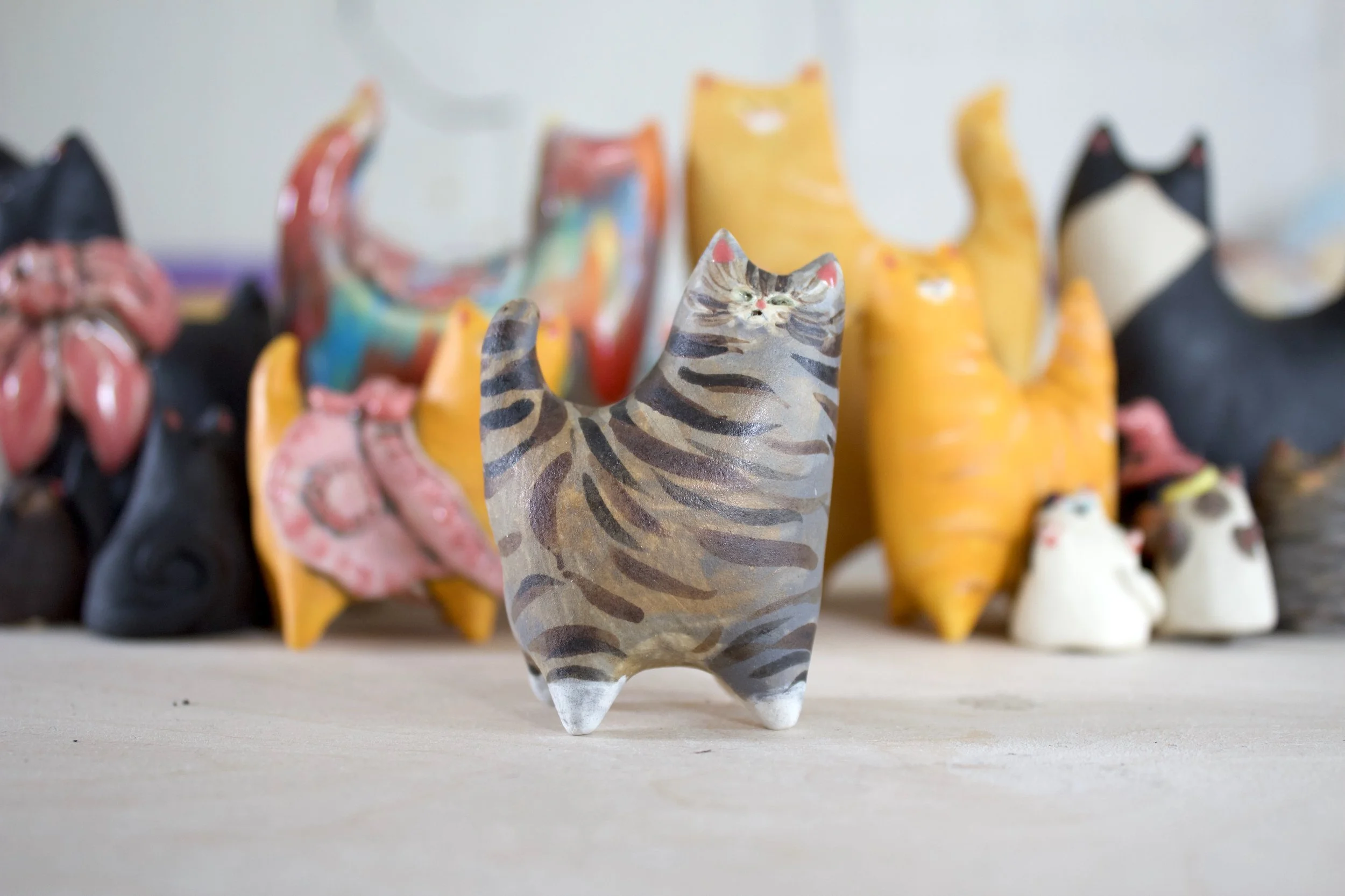 Standard Issue Tabby handmade ceramic cat sculpture.jpeg