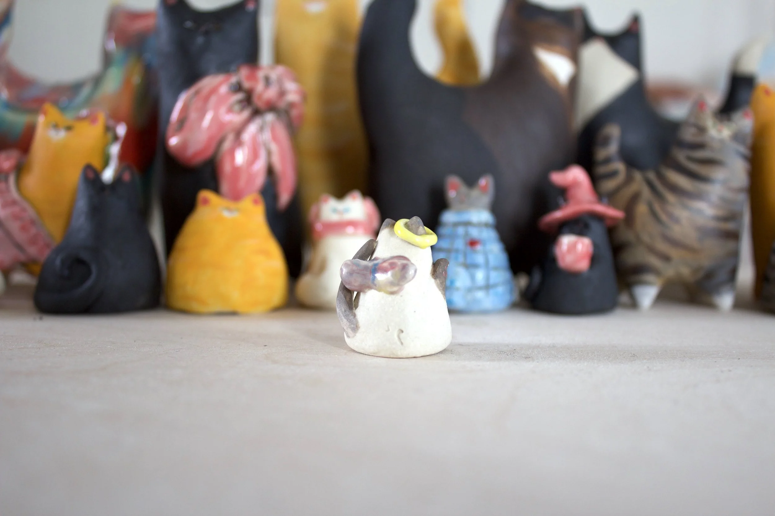 Back view Lilac Point Siamese angel ceramic cat chime with sculpted wings.jpeg