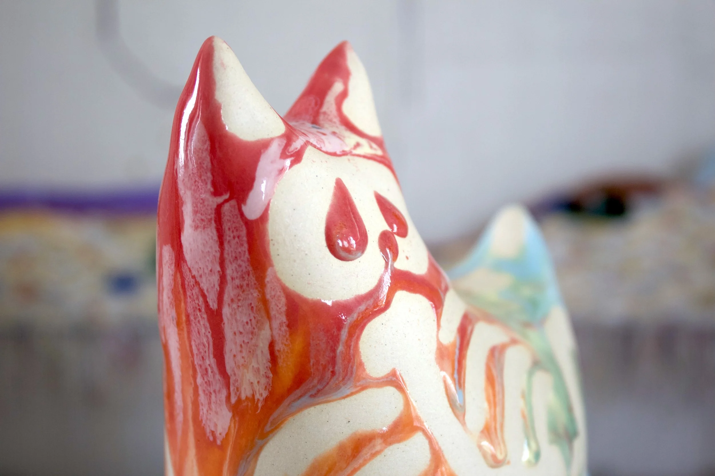 Detail view of the XL Collector Pastel Goo Skeleton White Cat showing sculpted pastel goo and skeleton details.jpegjpeg