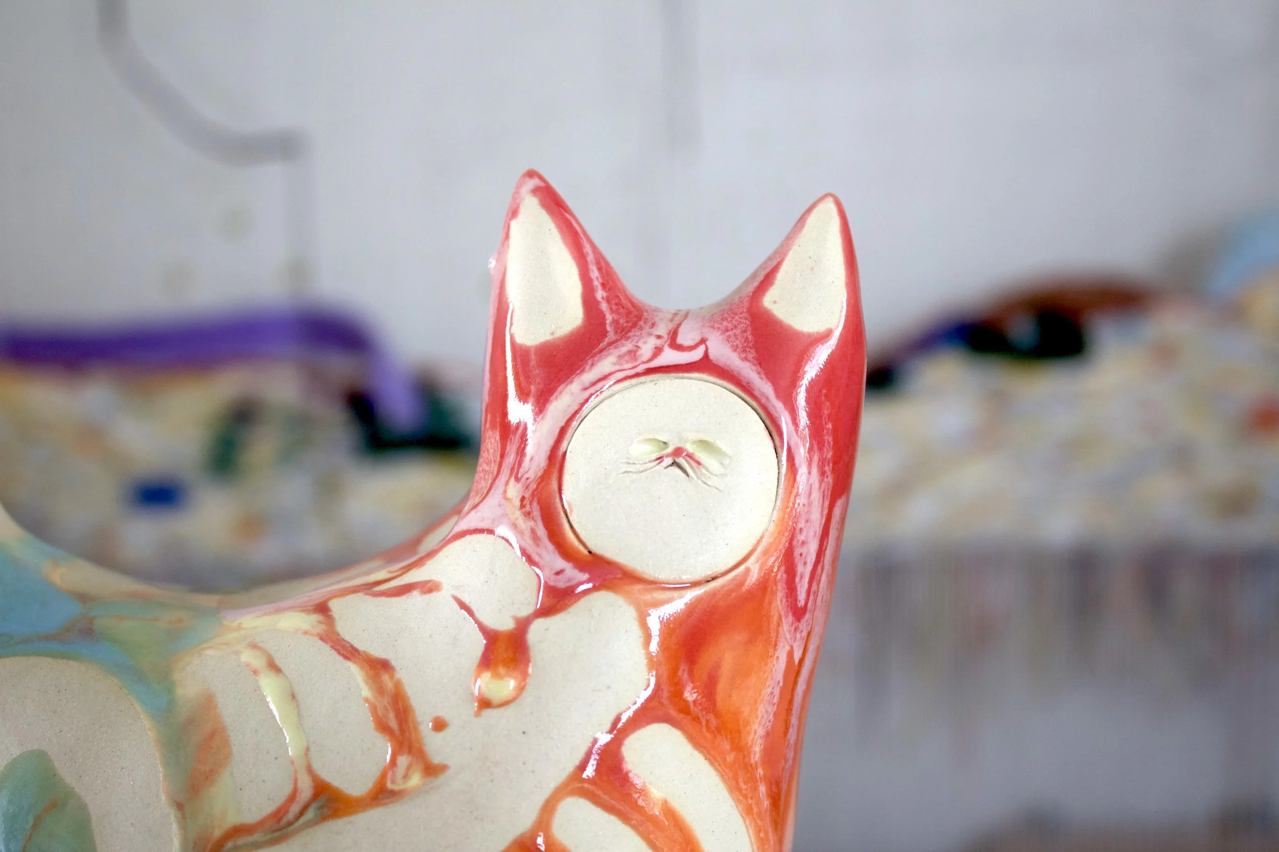 Detail view of the XL Collector Pastel Goo Skeleton White Cat showing sculpted pastel goo and skeleton details.jpegjpeg