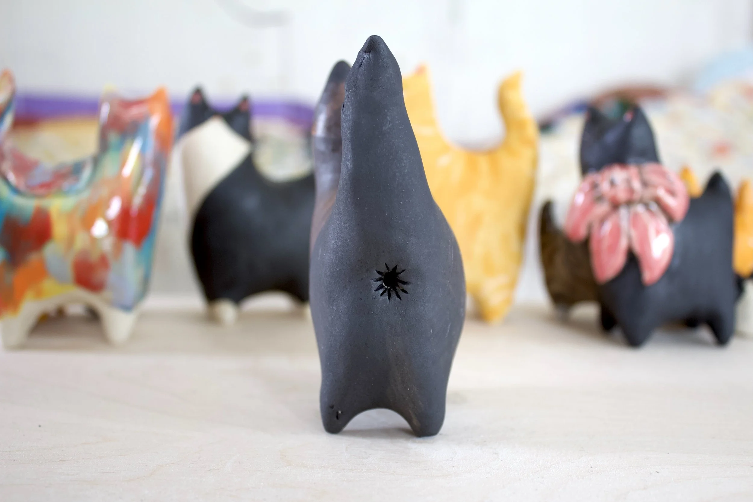 Back view Chocolate Point Siamese handmade ceramic cat sculpture.jpeg