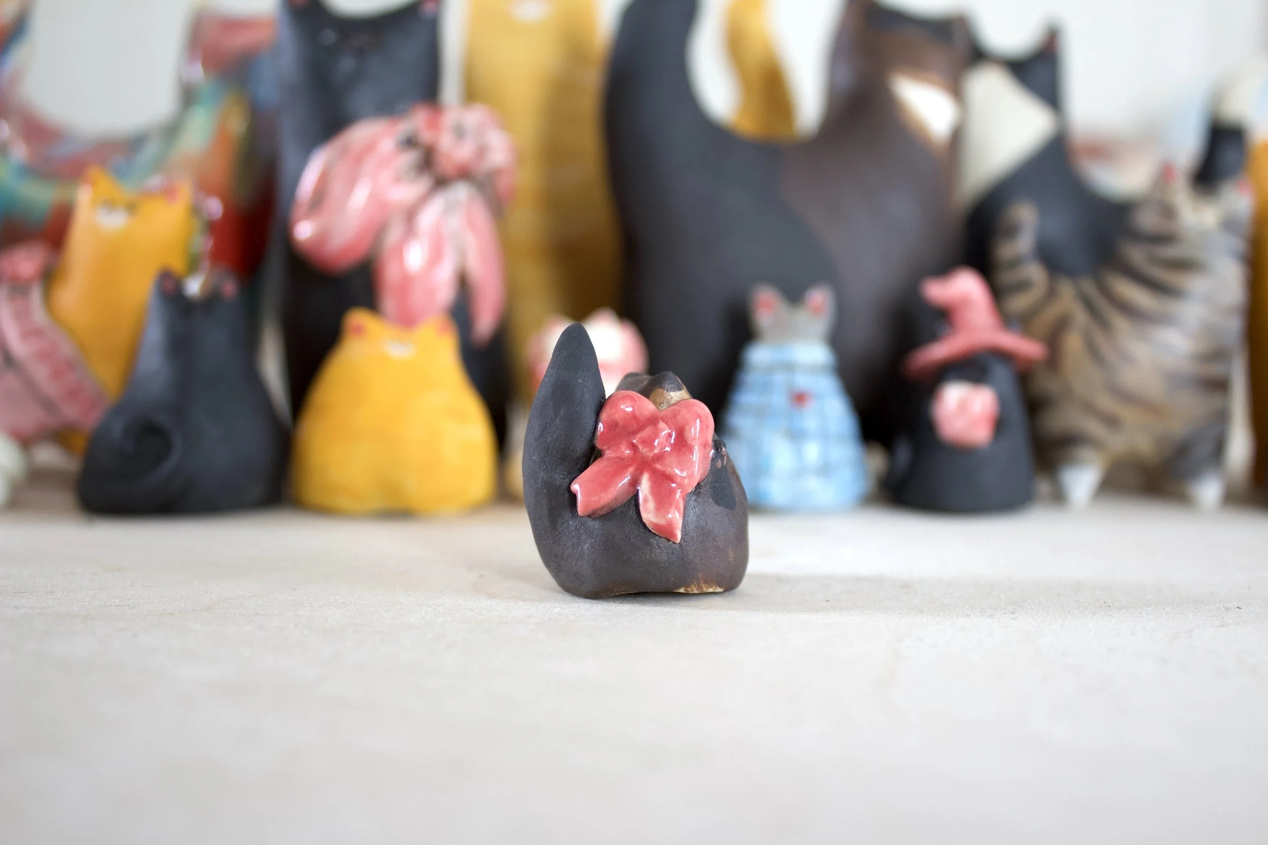 Handmade Chocolate Point Siamese ceramic cat chime side detail.jpeg