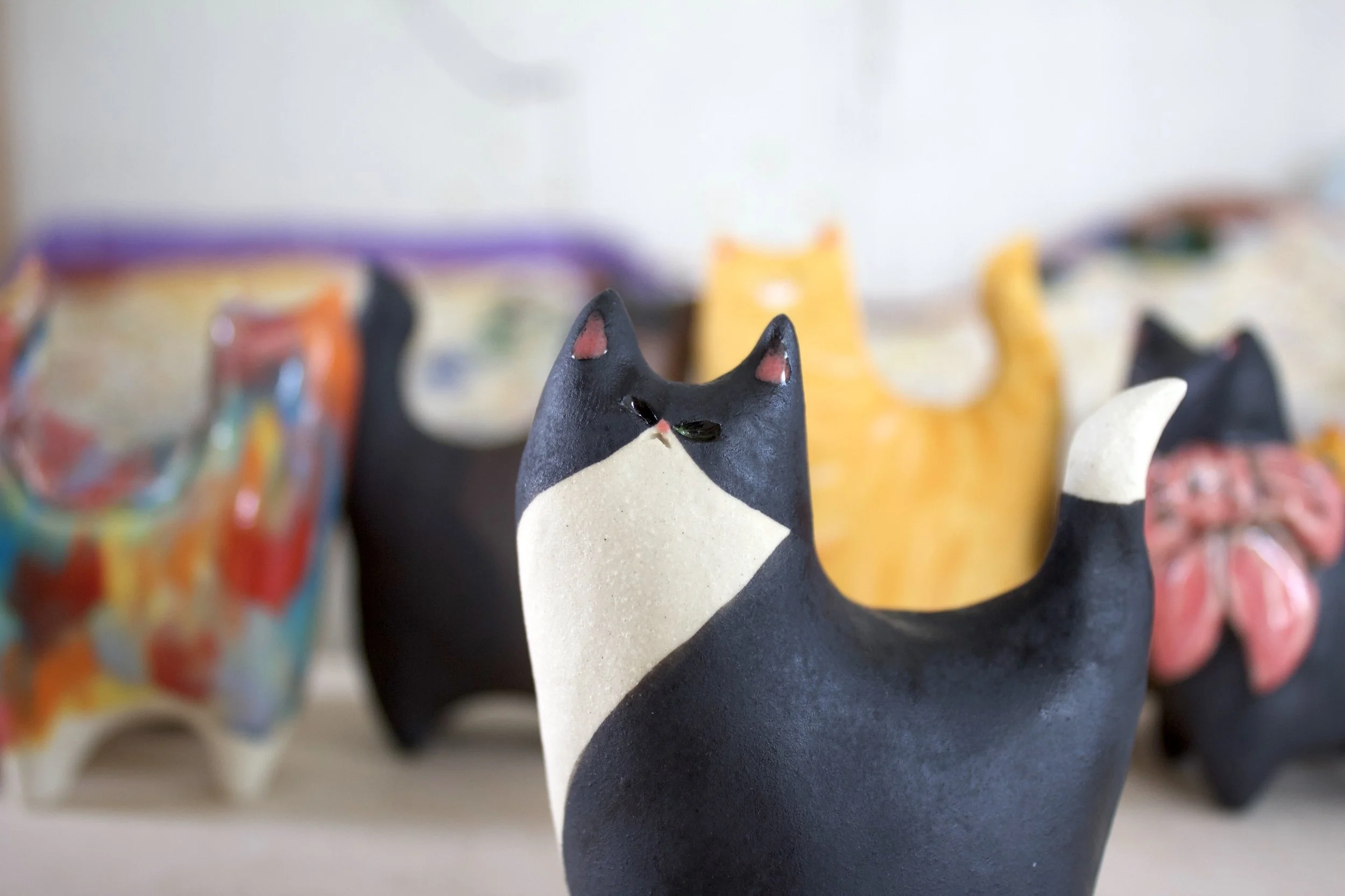 Handmade Tuxedo ceramic cat sculpture detail.jpeg