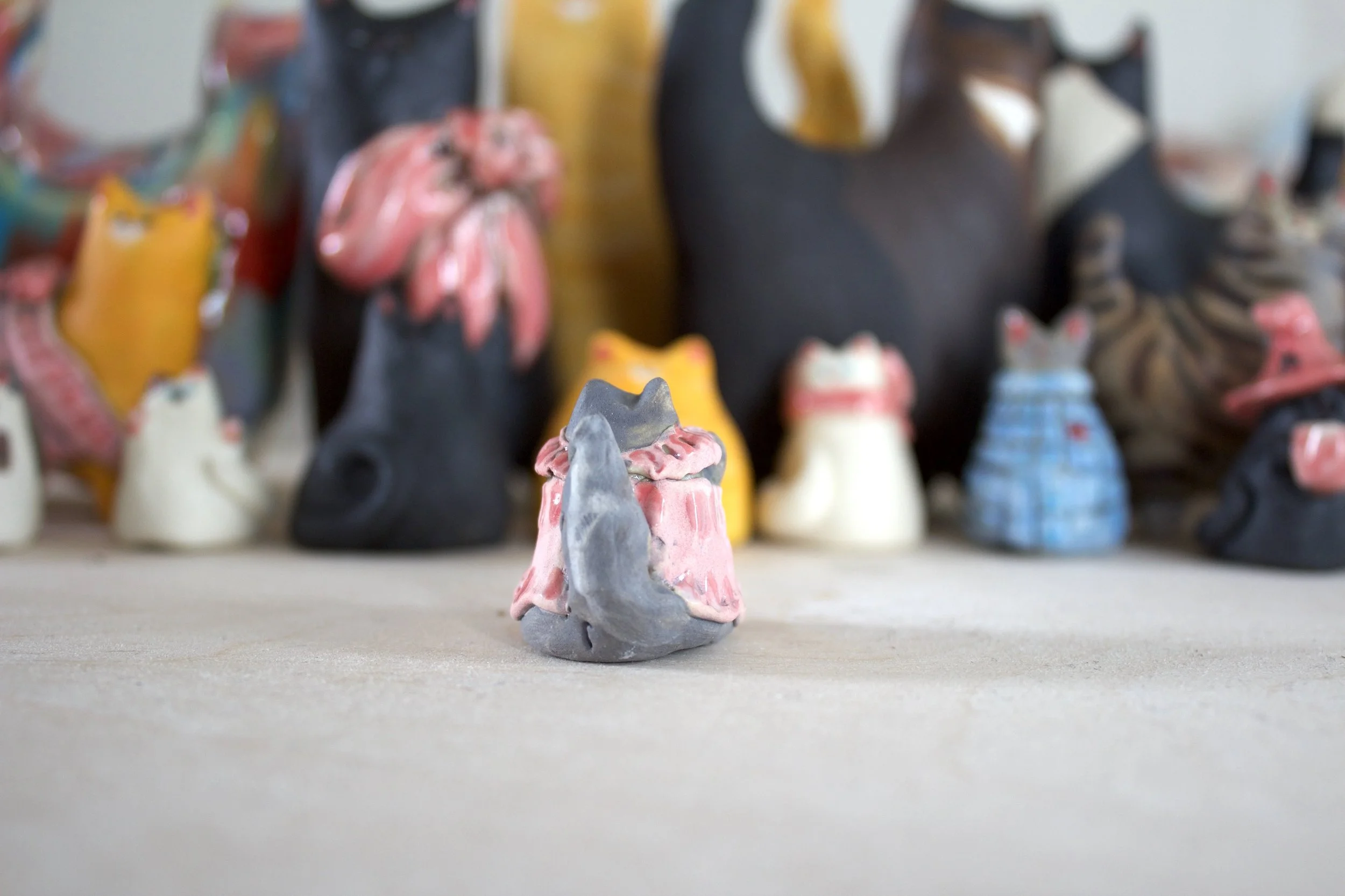 Back view gray handmade ceramic cat chime.jpeg