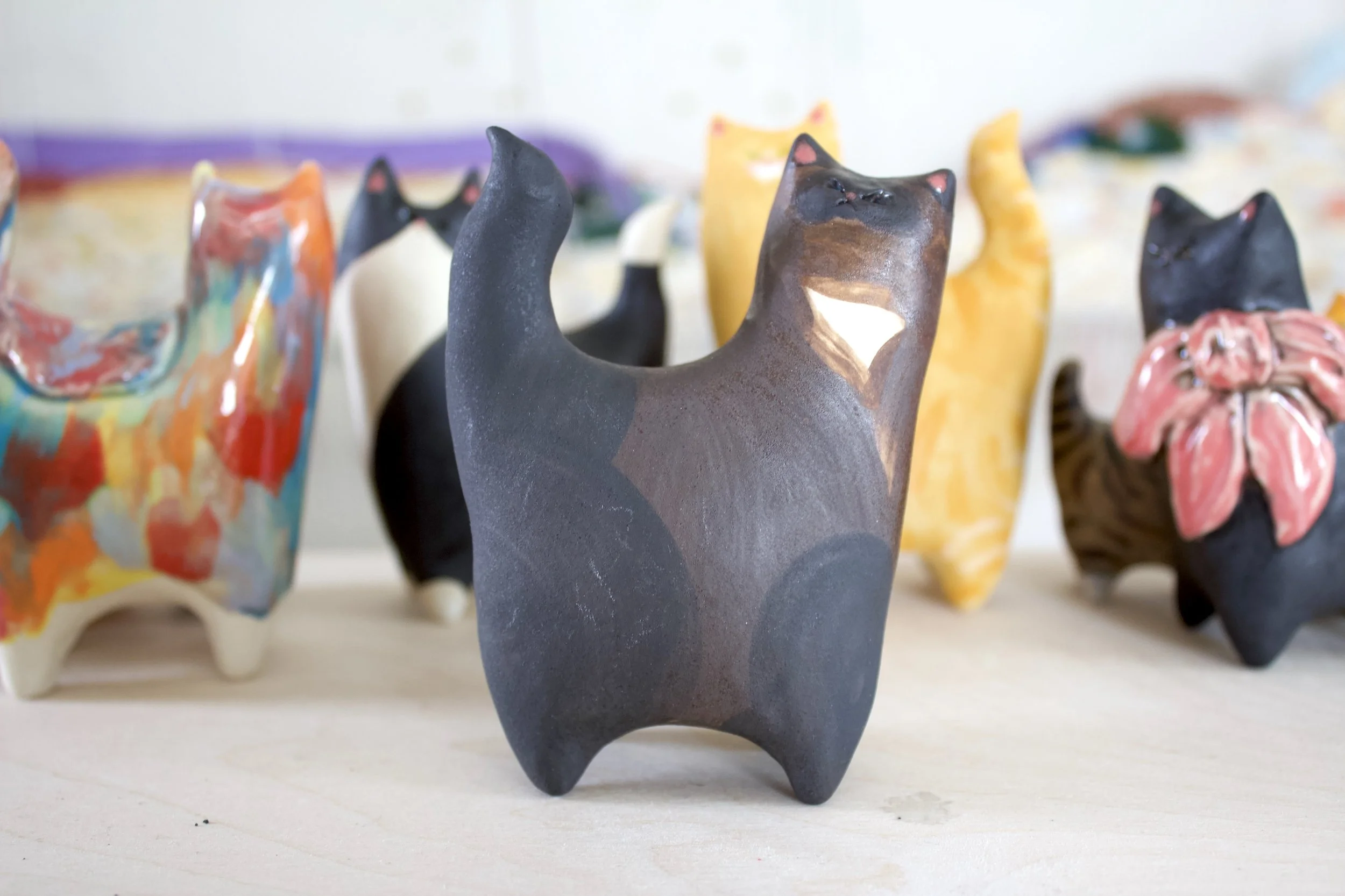 Chocolate Point Siamese handmade ceramic cat sculpture.jpeg