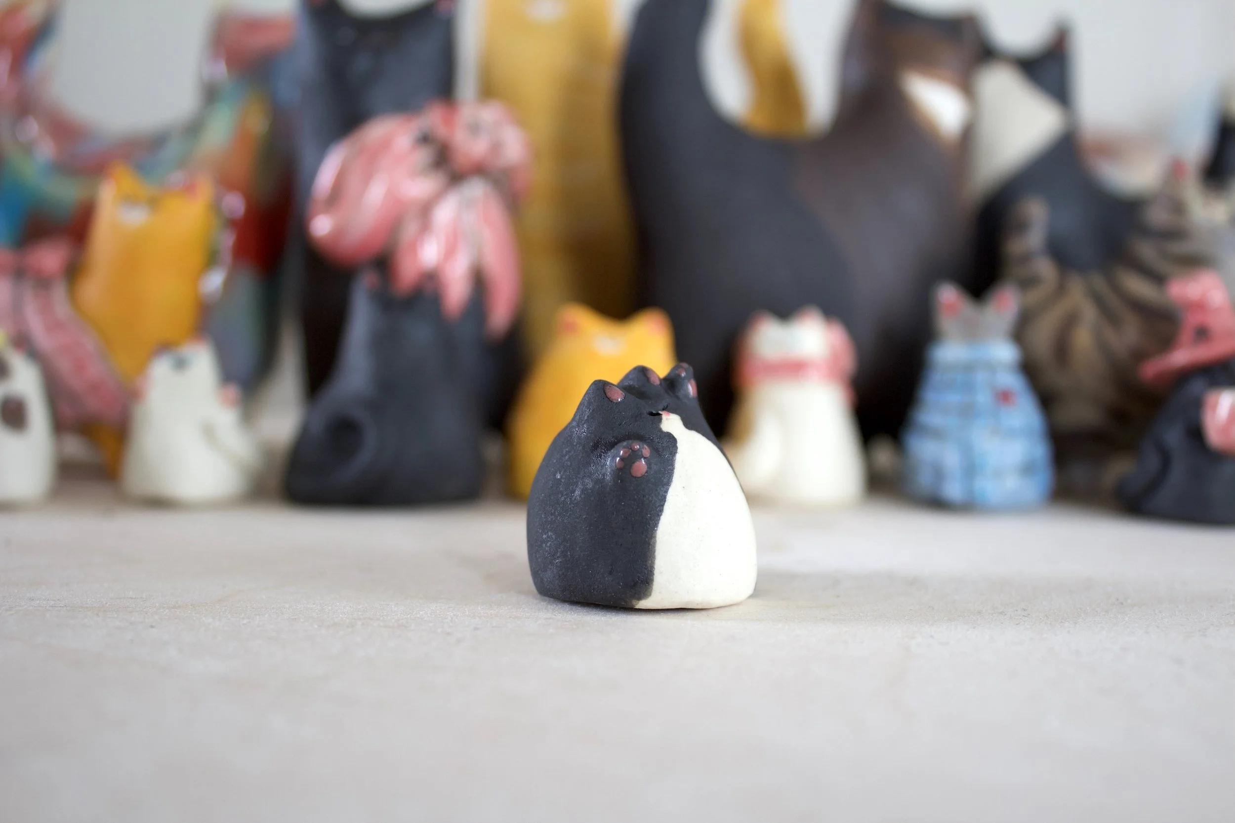 Handmade Tuxedo ceramic cat sculpture detail.jpeg