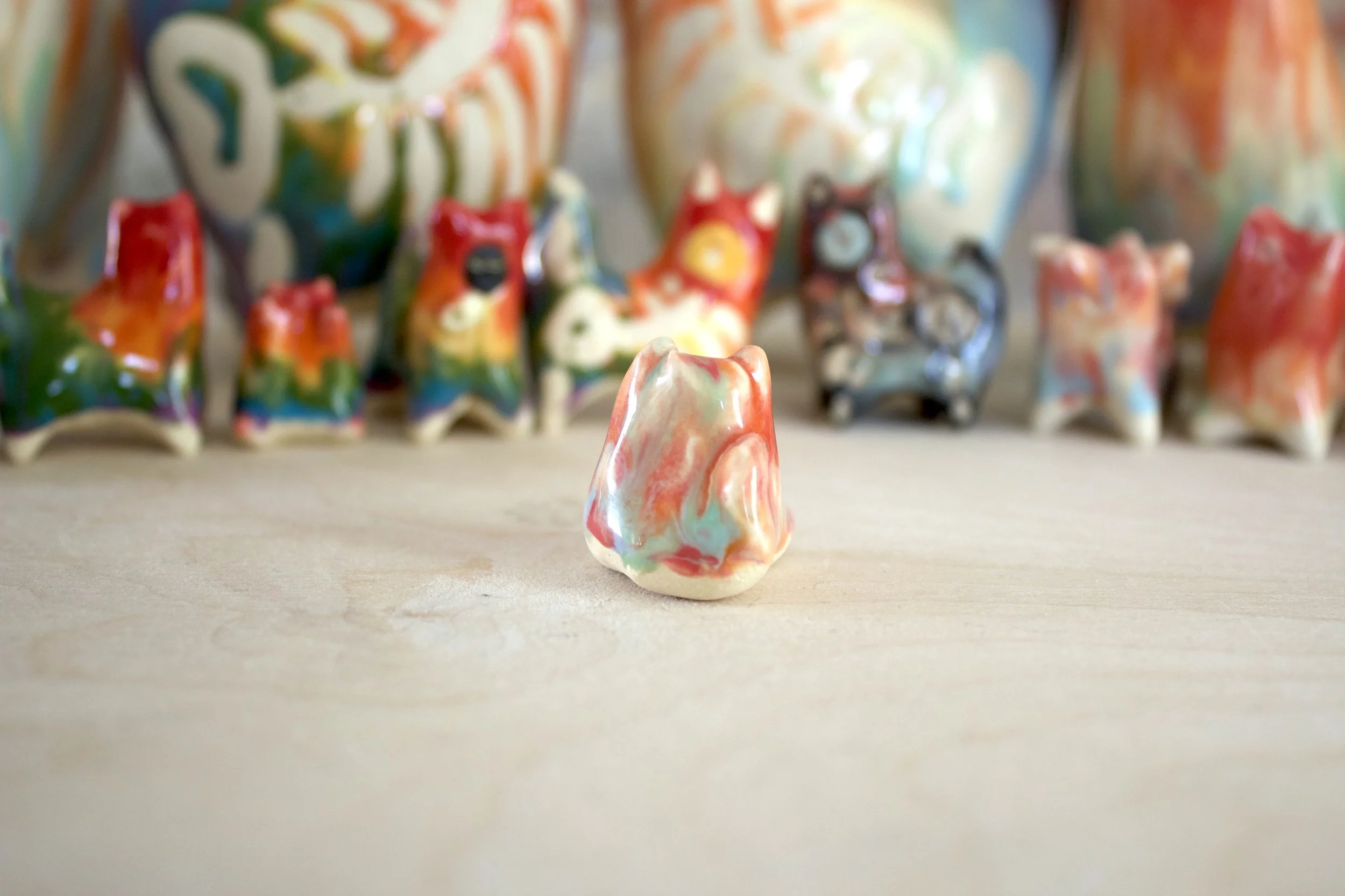 Back view of Pastel Rainbow Cat No. 1 showing soft pastel rainbow details.jpeg