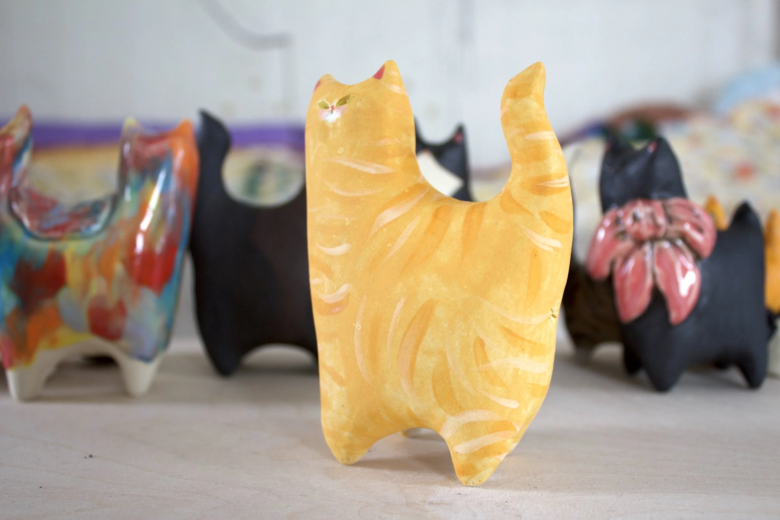 Side view Ginger Tabby ceramic cat sculpture.jpeg