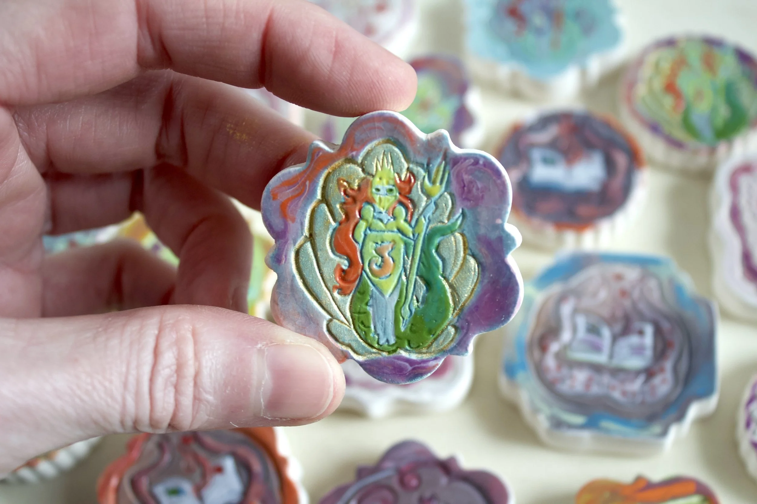 RuthIrving_CeramicsMiniMagnets-MermaidQueenWarrior.jpeg