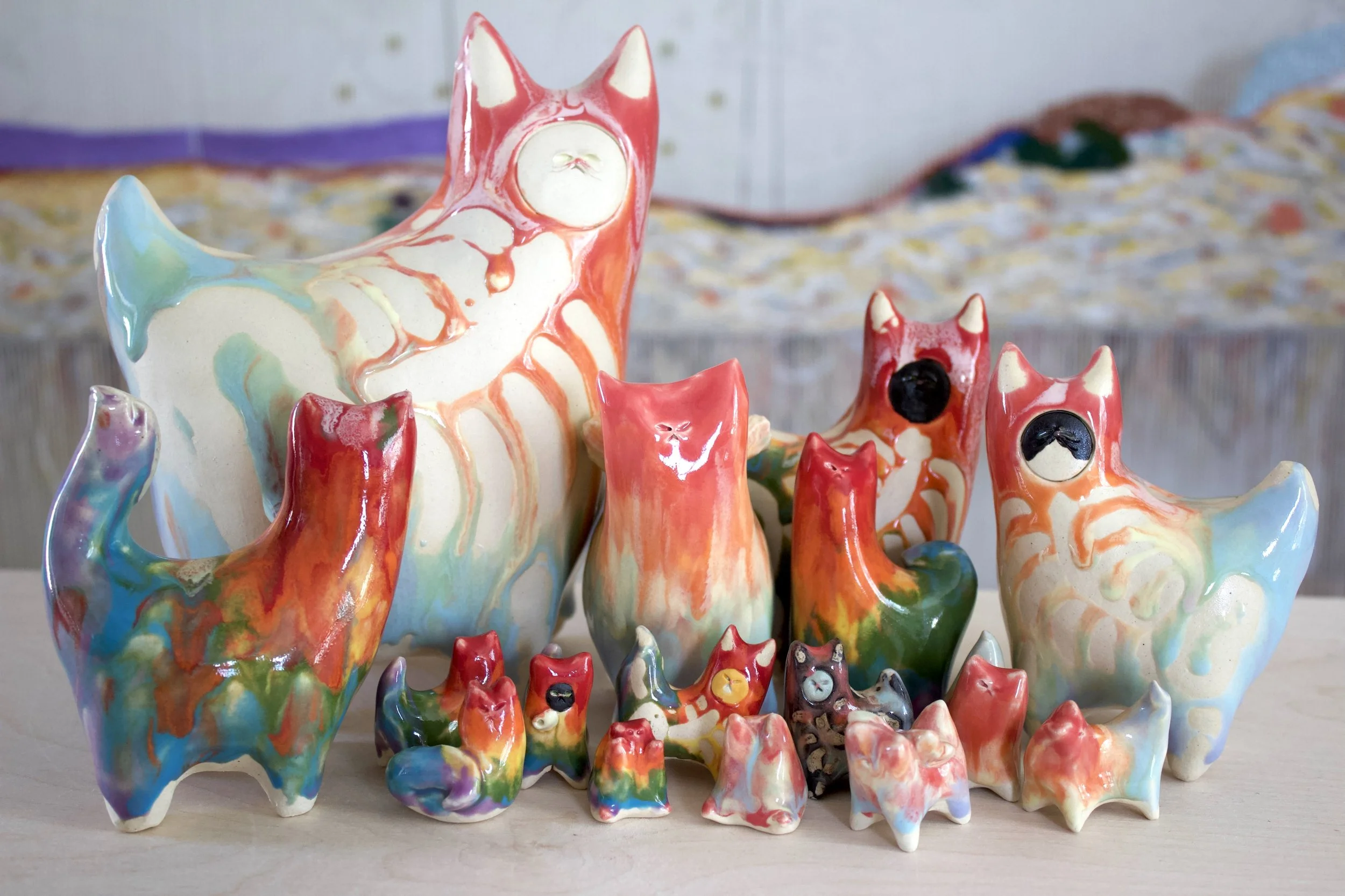 Rainbow Goo Collection featuring one-of-a-kind handmade ceramic cat sculptures in bright and pastel rainbow colors.jpeg