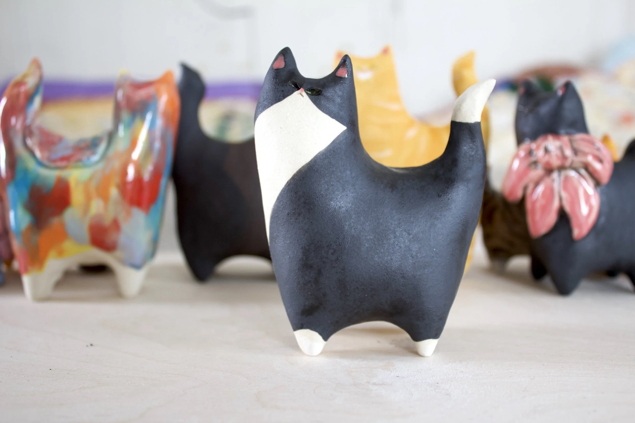 Tuxedo handmade ceramic cat sculpture.jpeg