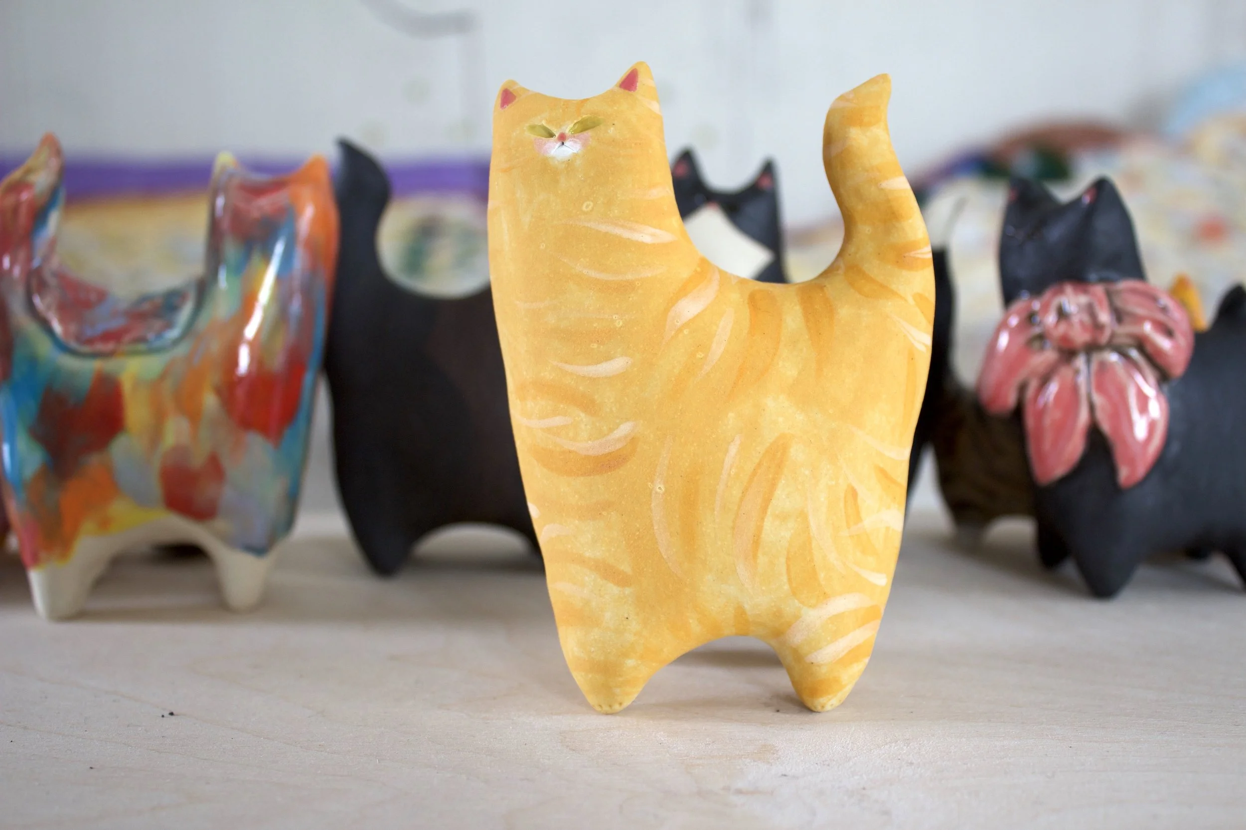 Ginger Tabby handmade ceramic cat sculpture.jpeg