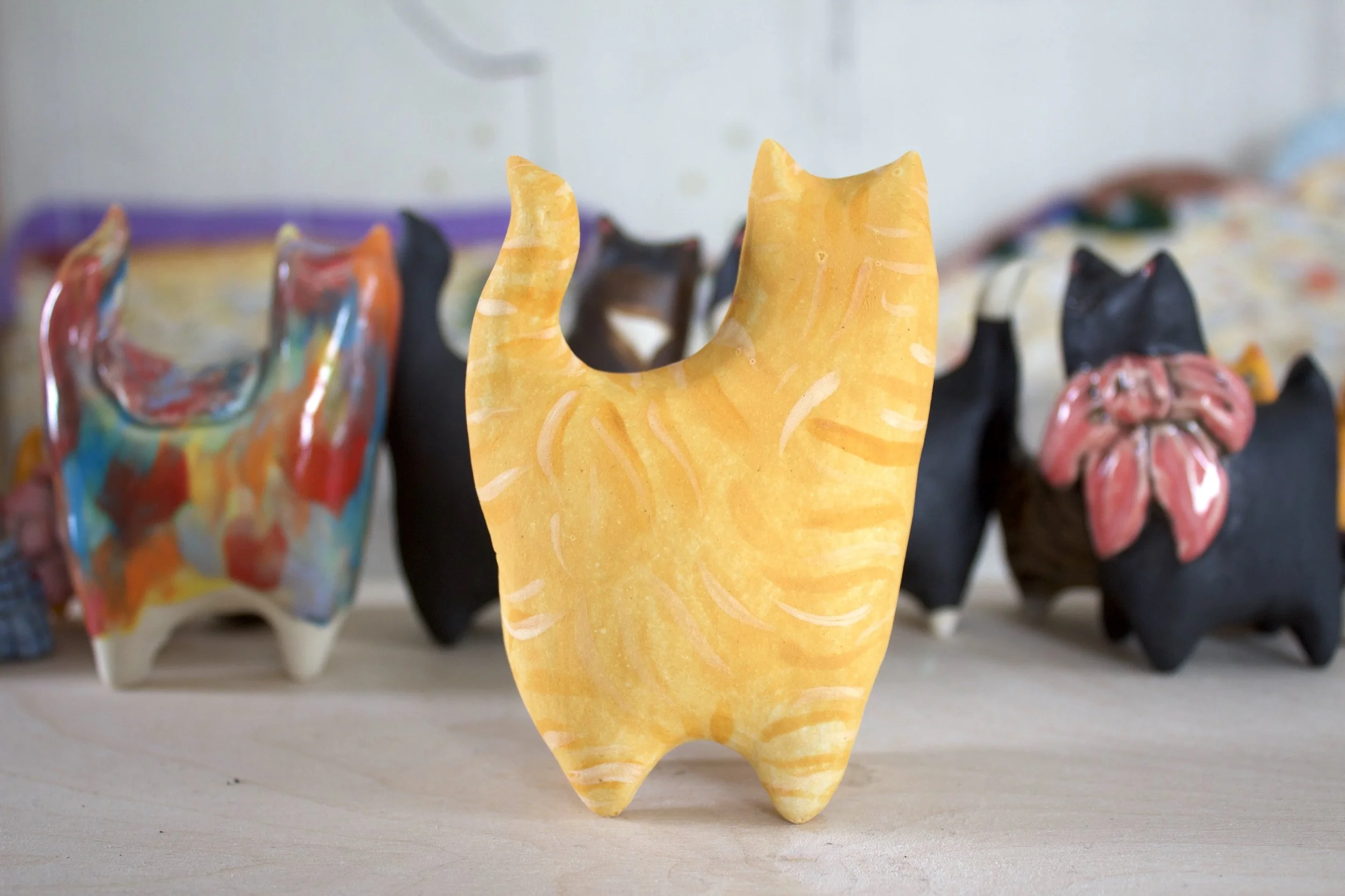 Side view Ginger Tabby ceramic cat sculpture.jpeg