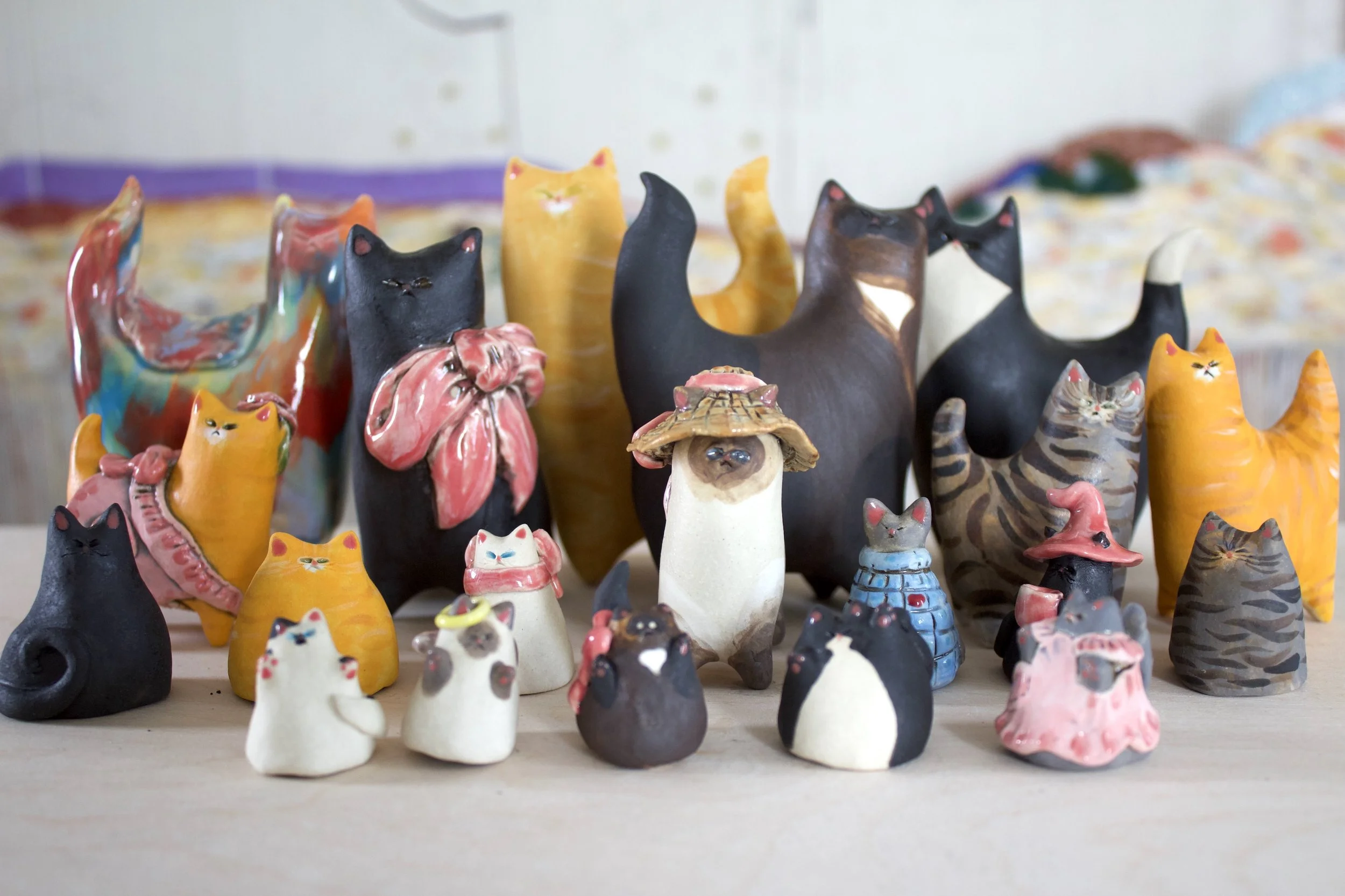 Handmade ceramic cat sculpture collection by Ruth Irving Studio.jpeg