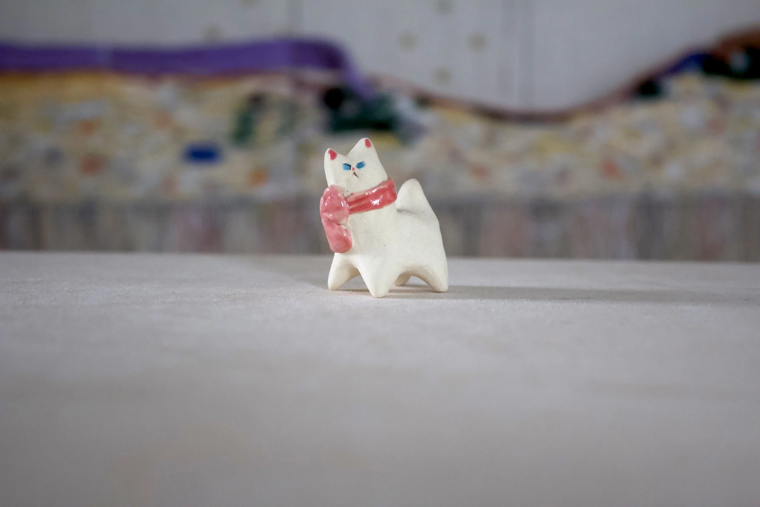 White Cat with Pink Bow and Blue Eyes - Cat Sculpture with Food Bowl