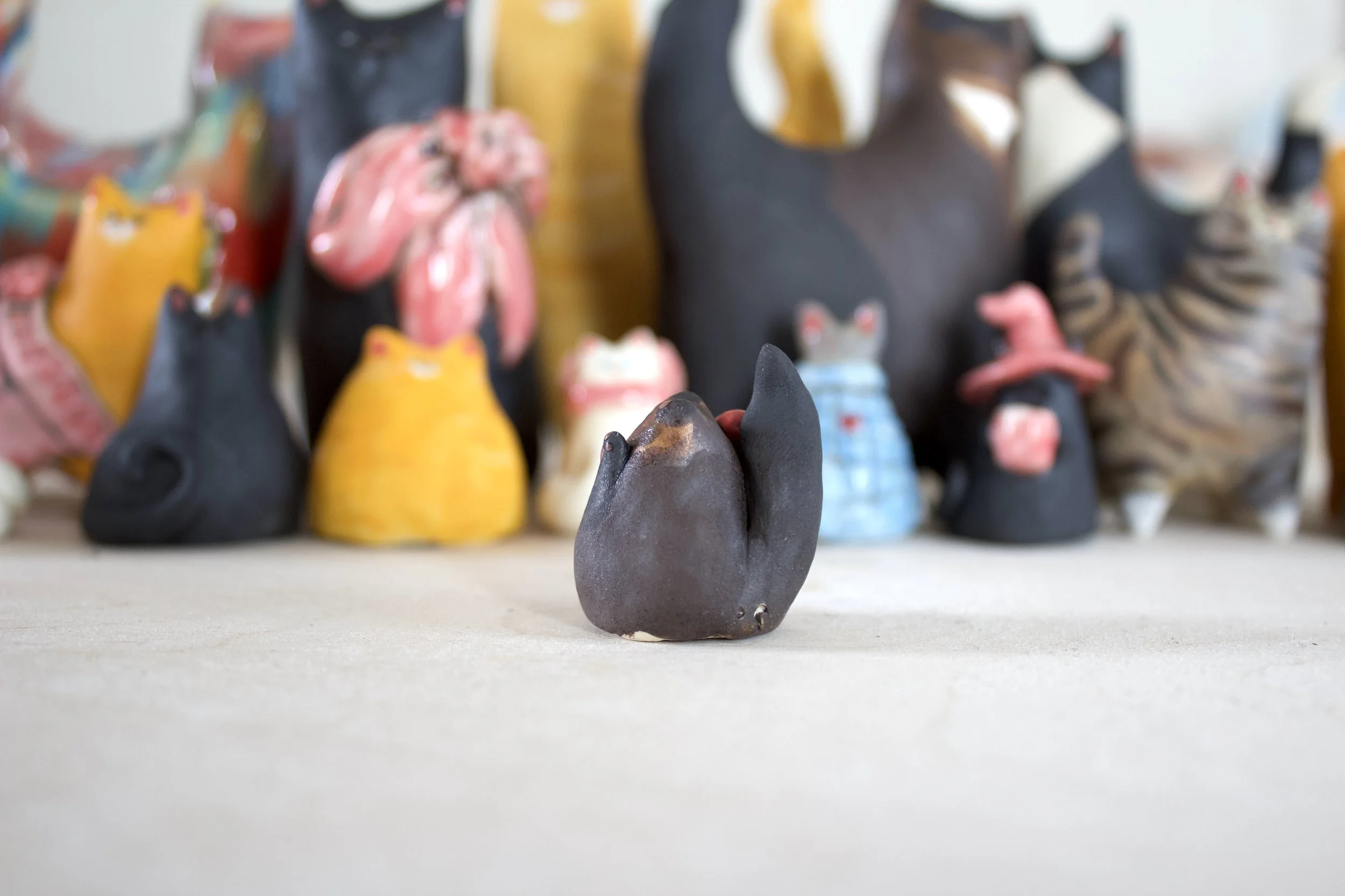 Side view Chocolate Point Siamese ceramic cat chime sculpture.jpeg