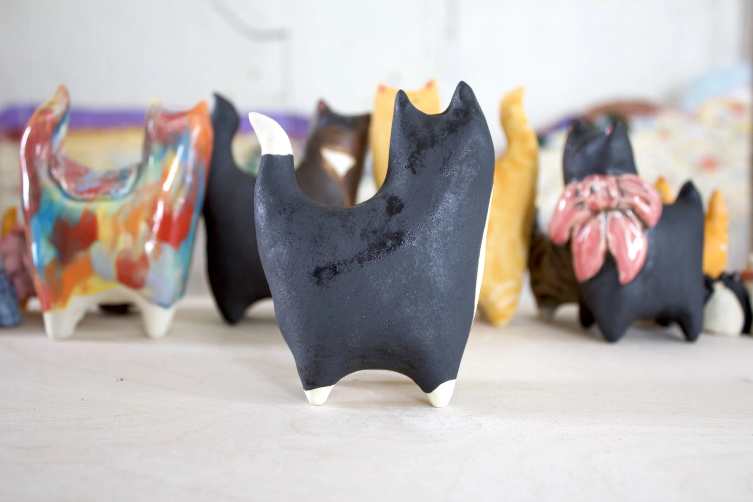 Side view Tuxedo ceramic cat sculpture.jpeg