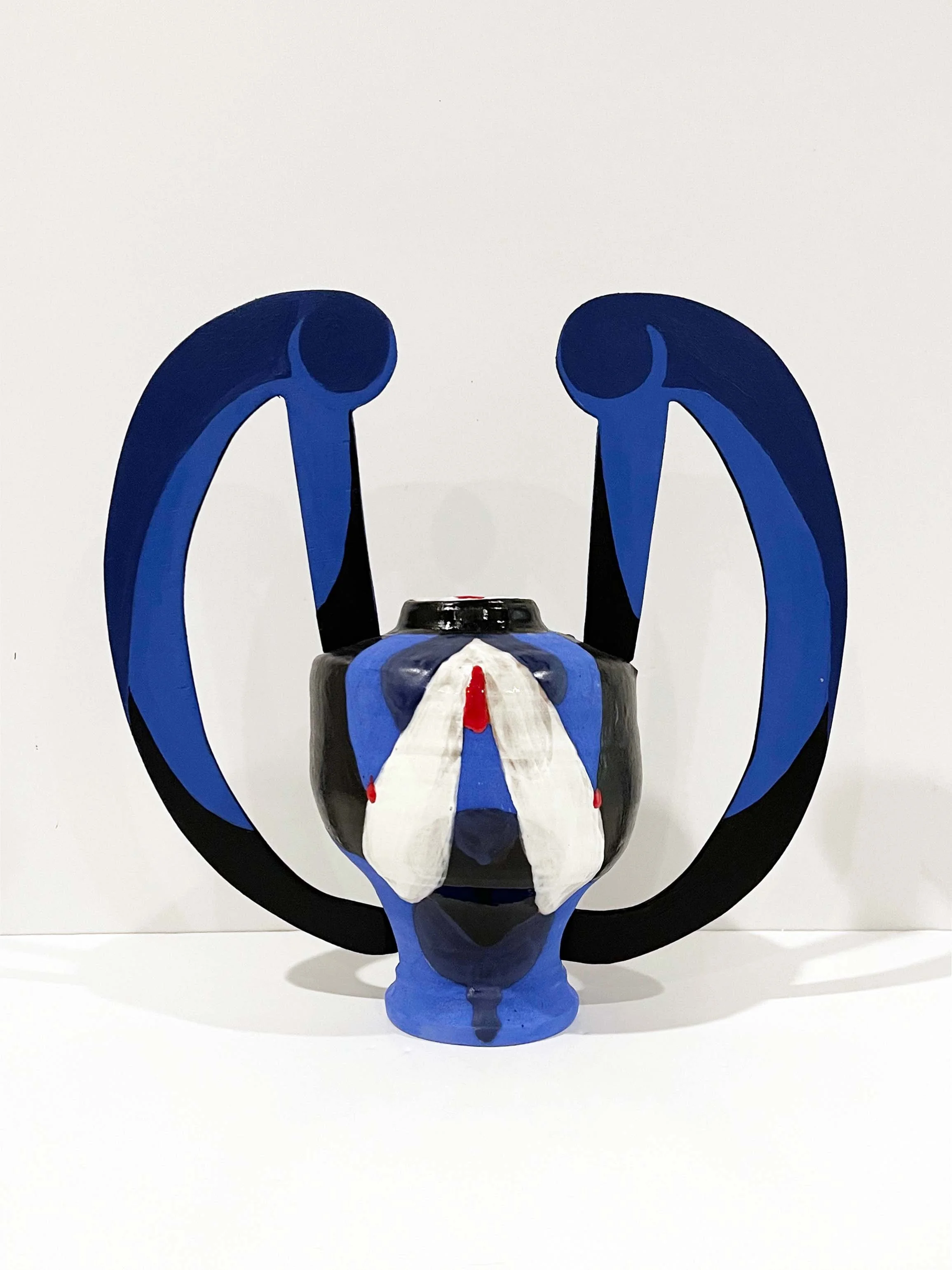 Daley.Blue:red.rounded.back.jpg