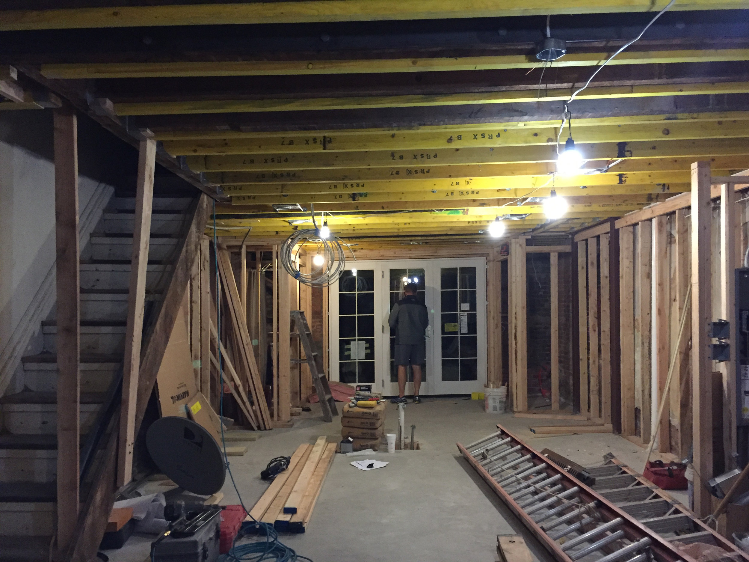 Floor poured with in-slab hydronic heat  system, walls framed, and electrical roughed in